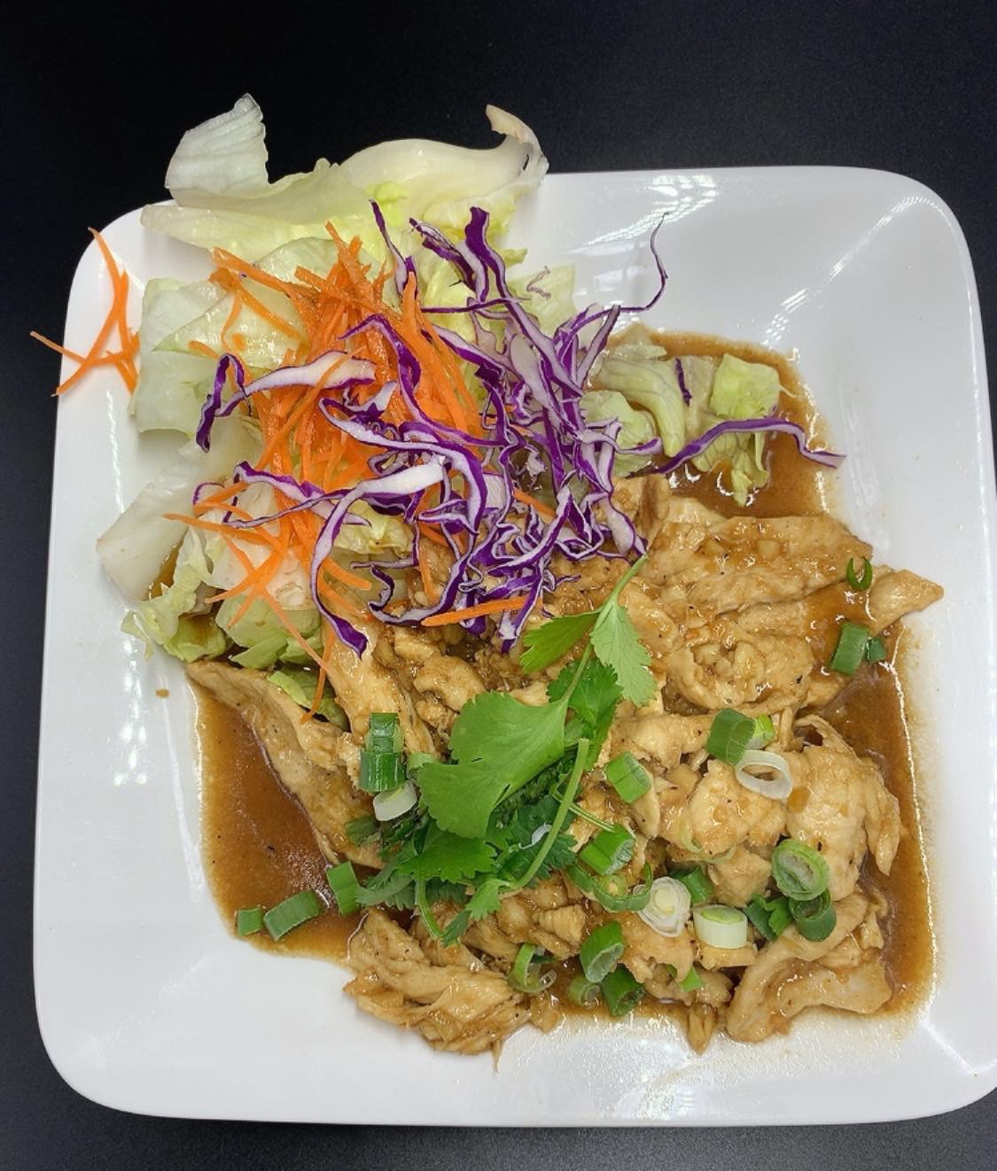 Order Garlic Meat food online from Exotic Thai Cafe store, Woodland Hills on bringmethat.com