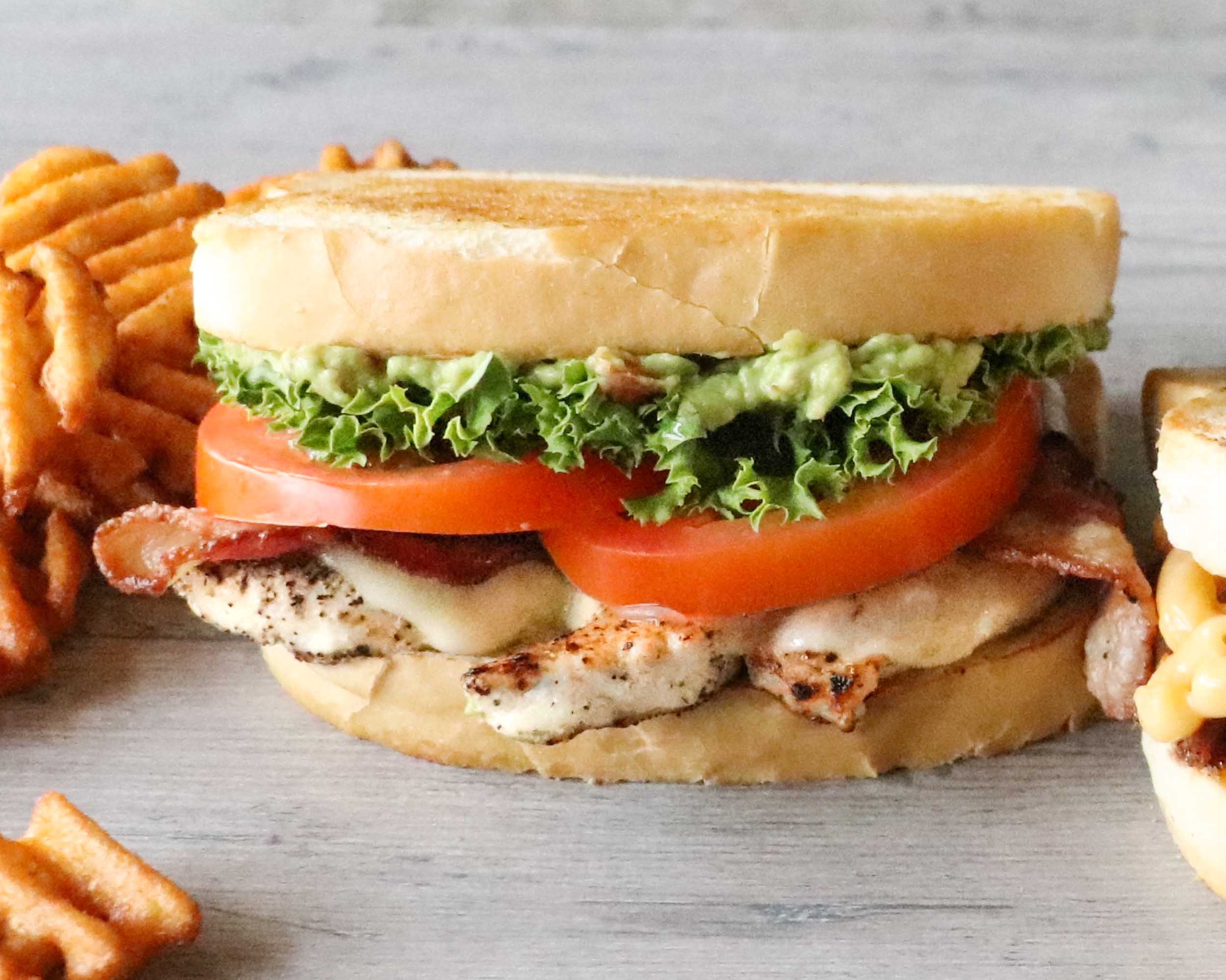 Order Avocado Chicken Club Sandwich food online from Scotty's brewhouse store, Bloomington on bringmethat.com