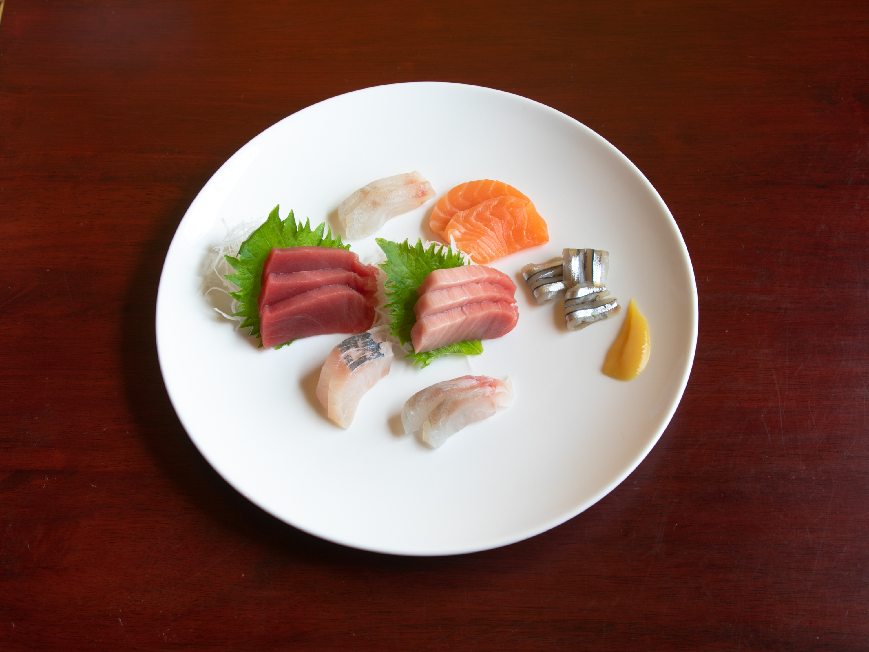 Order Sashimi Combo food online from Inase Sushi store, New York on bringmethat.com