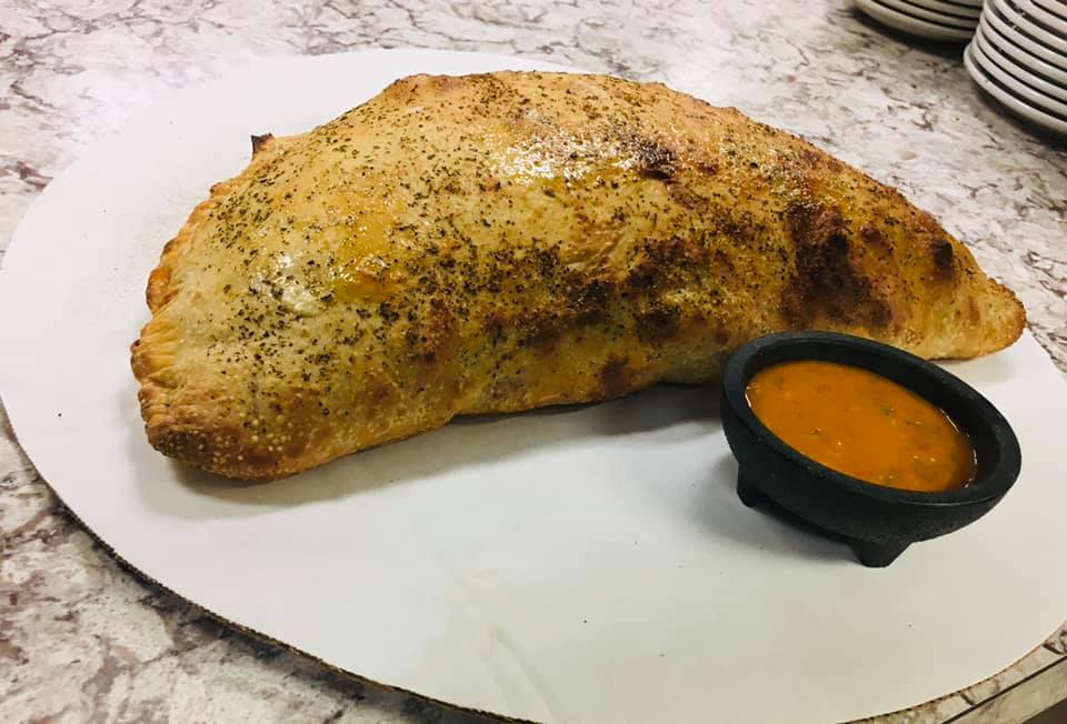 Order 14" Meateater Calzone food online from Reme Restaurant store, Plainfield on bringmethat.com
