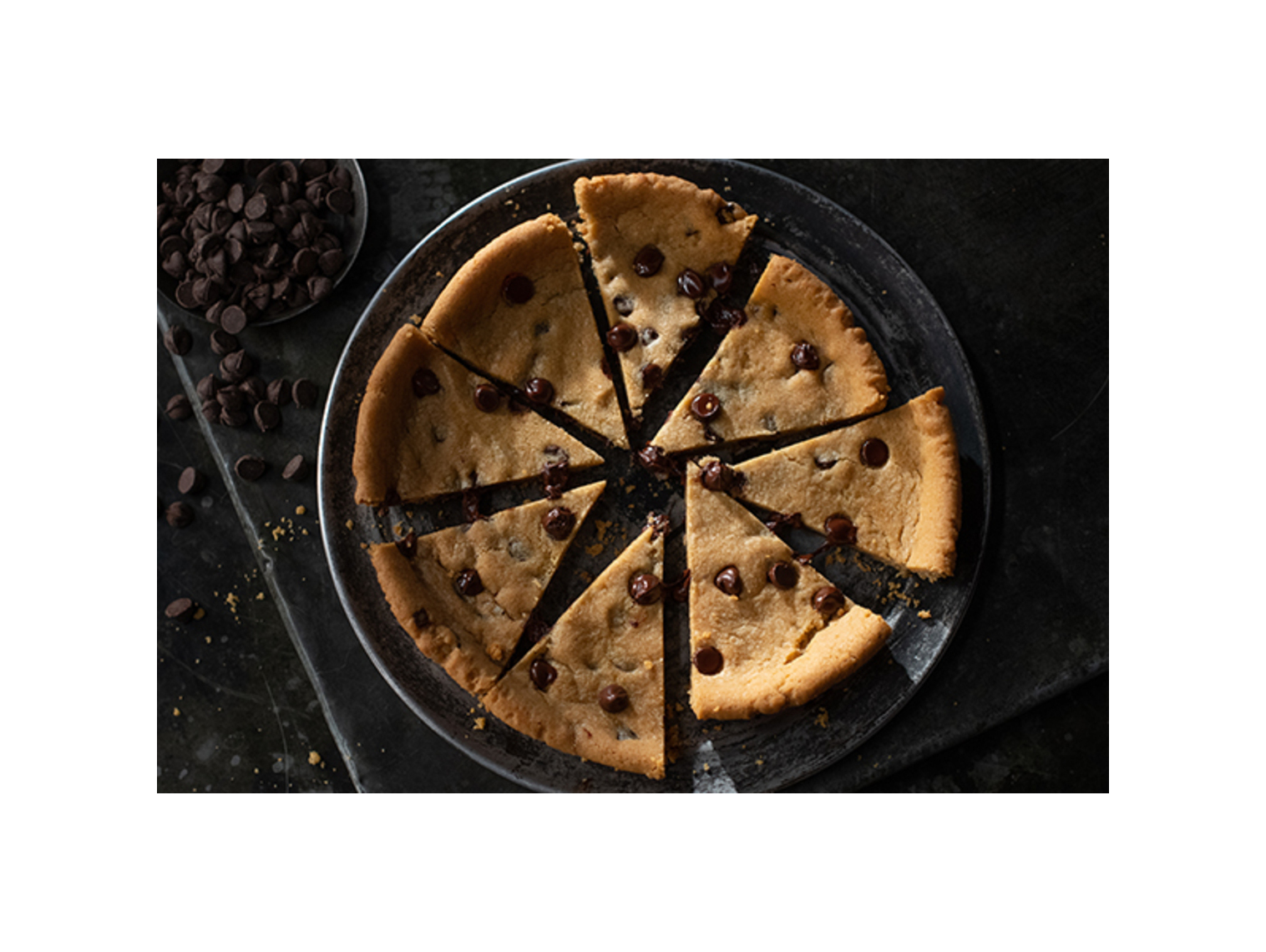 Order 8” Chocolate Chip Cookie food online from Jet's Pizza store, Bowling Green on bringmethat.com