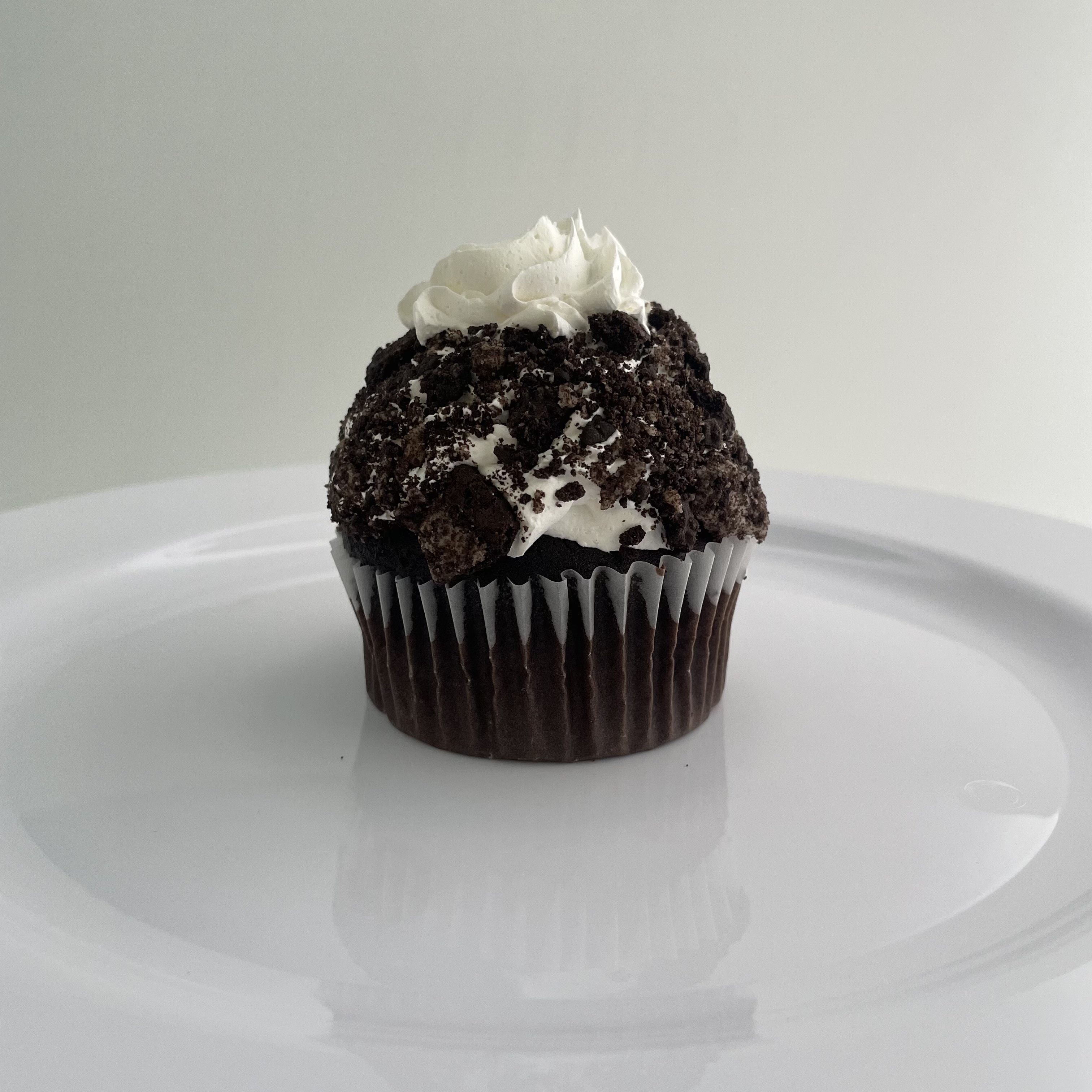 Order Cookies and Cheesecake Cupcake food online from The House of Cupcakes store, Princeton on bringmethat.com