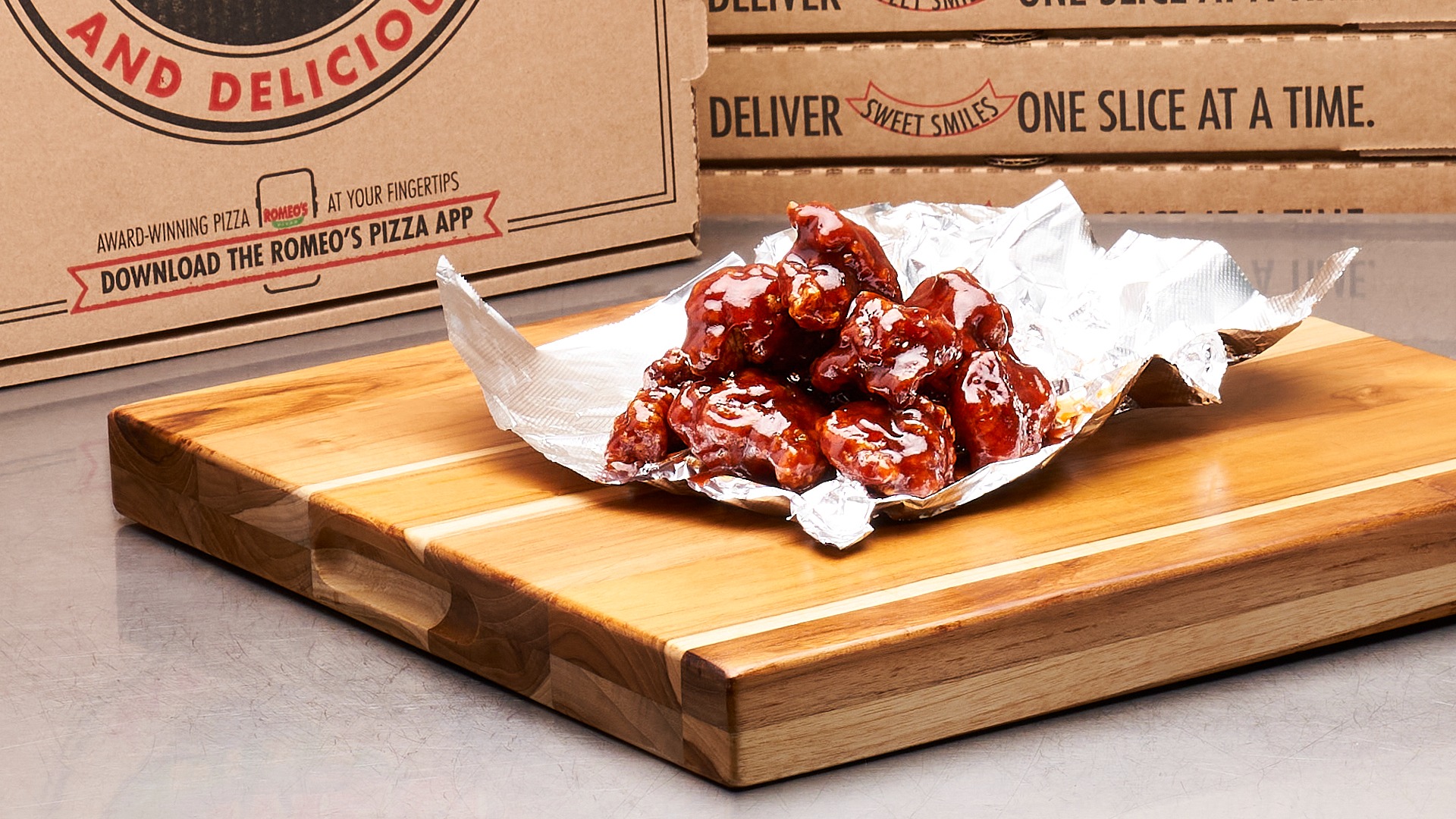 Order Boneless Wings food online from Romeo Pizza store, Grove City on bringmethat.com