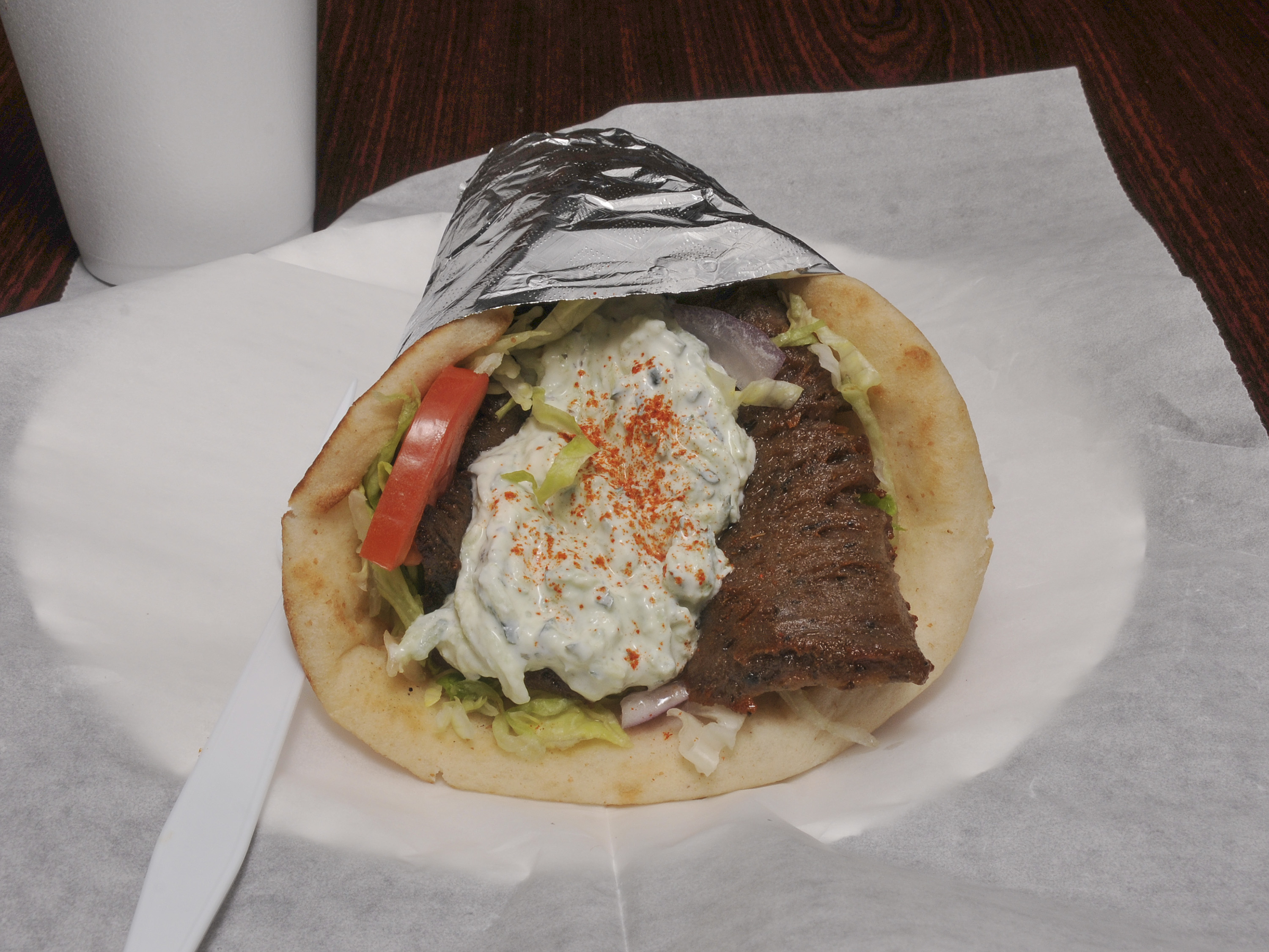 Order Gyro on Pita food online from Checkers pizza store, Raleigh on bringmethat.com
