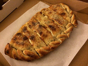 Order Build Your Own Calzone food online from Pizza Pit Extreme store, Iowa City on bringmethat.com
