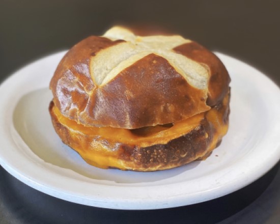 Order Pretzel Bun Sandwich - Cheese Melt food online from Sweetwaters store, Newark on bringmethat.com