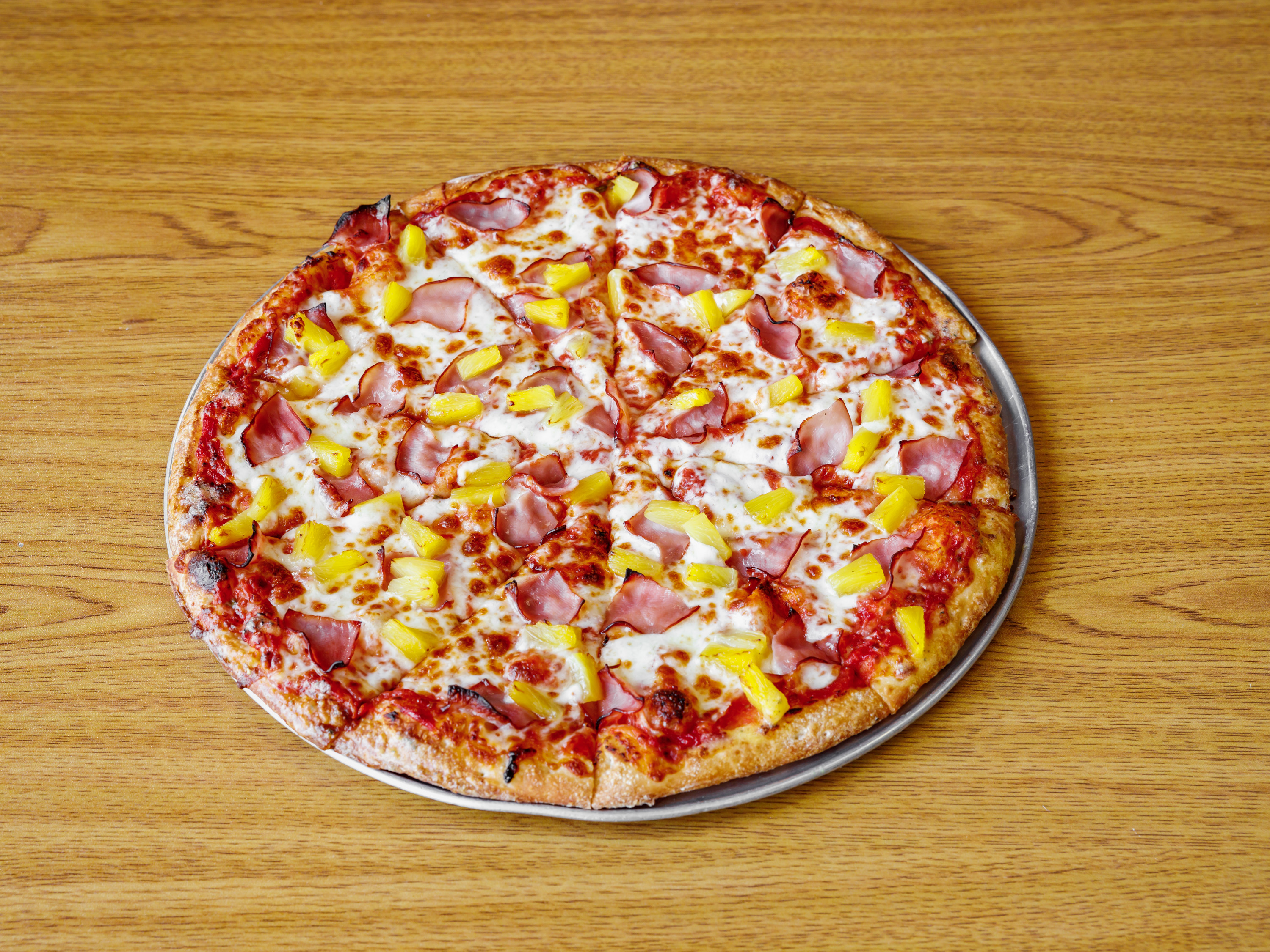 Order Hawaiian Pizza food online from Combo's Pizza store, Fullerton on bringmethat.com