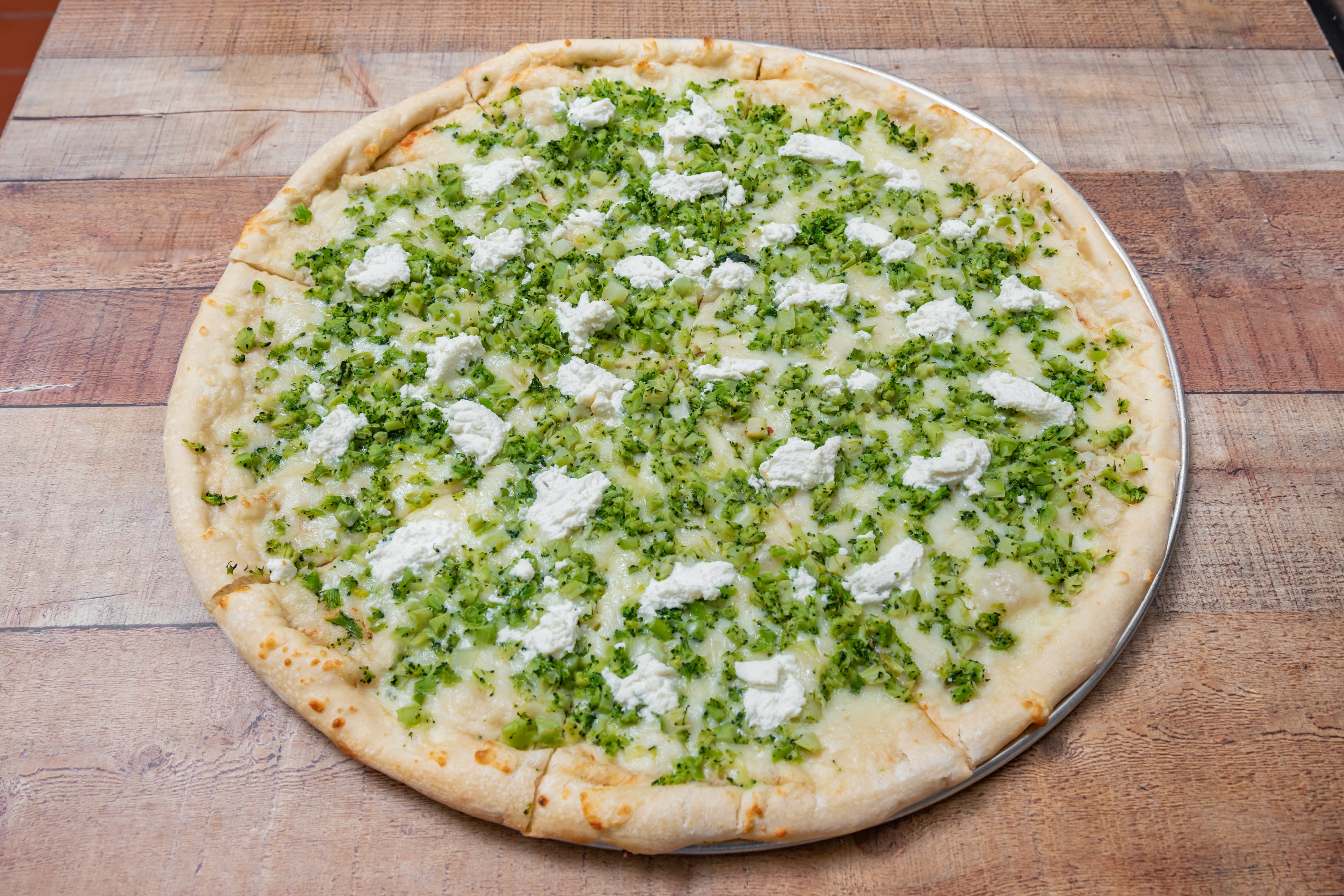 Order White Broccoli Pizza Slice - Slice food online from Ray #1 Pizza store, Whitehall on bringmethat.com