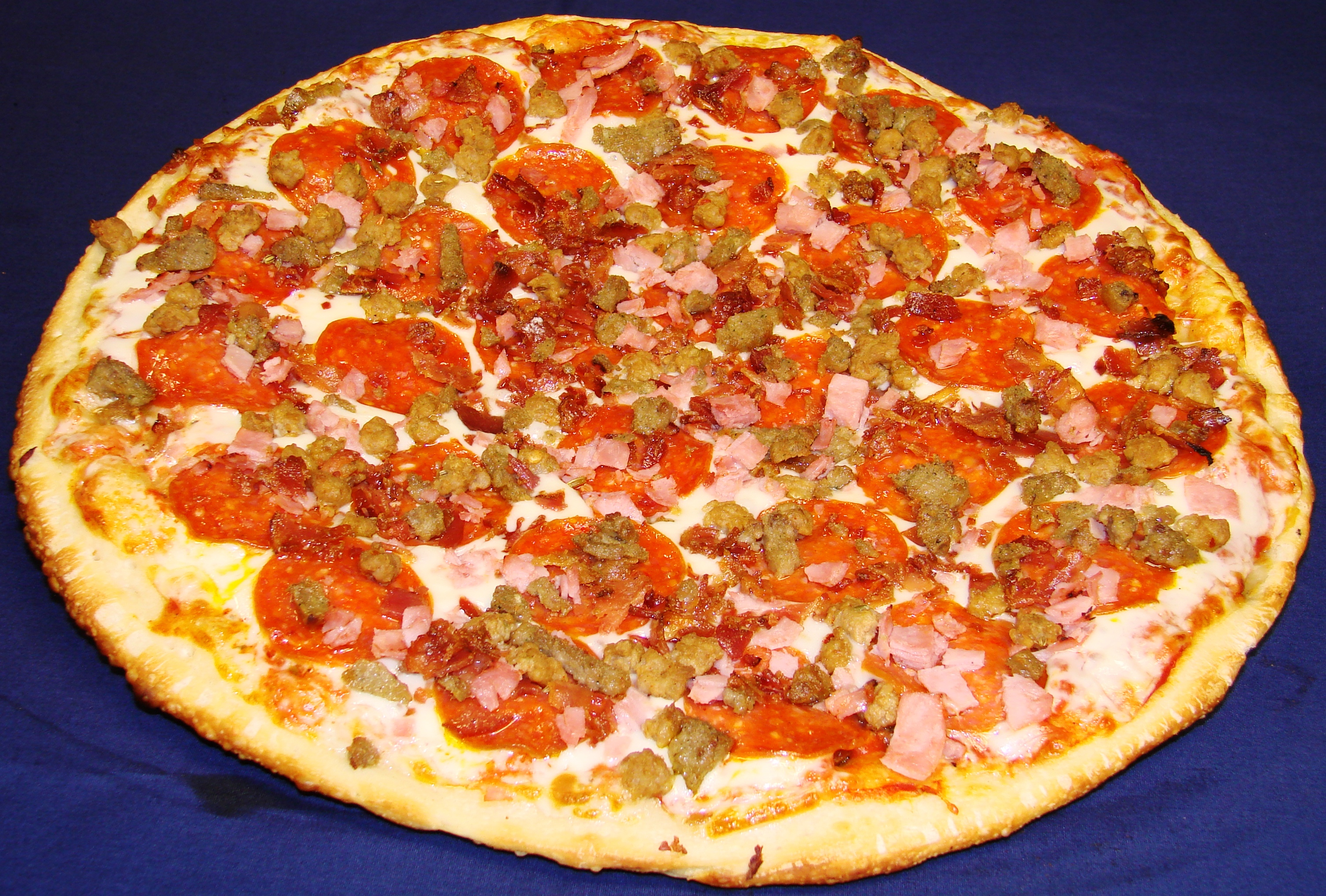 Order Meat Our Pizza food online from Calz Pizza Subs & Chicken Wings store, Virginia Beach on bringmethat.com