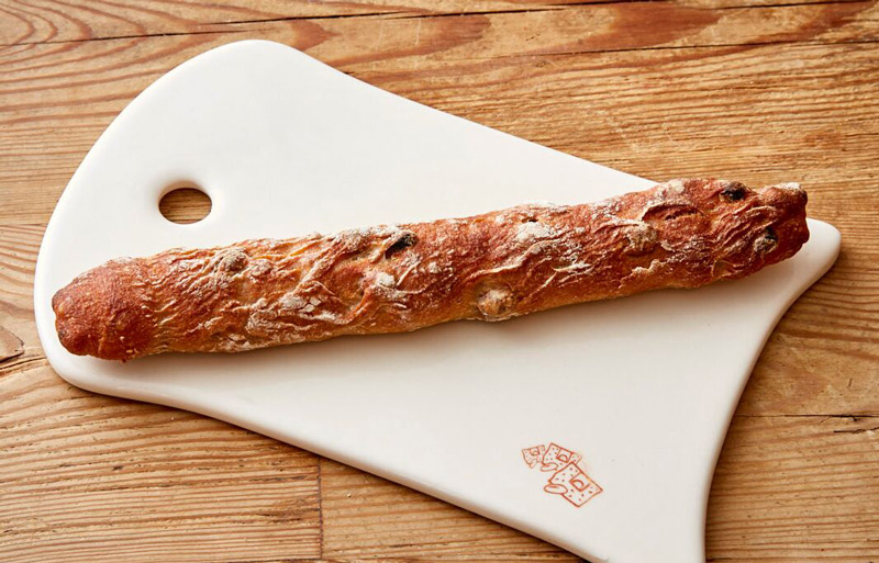 Order Organic Hazelnut Flute food online from Le Pain Quotidien store, Los Angeles on bringmethat.com