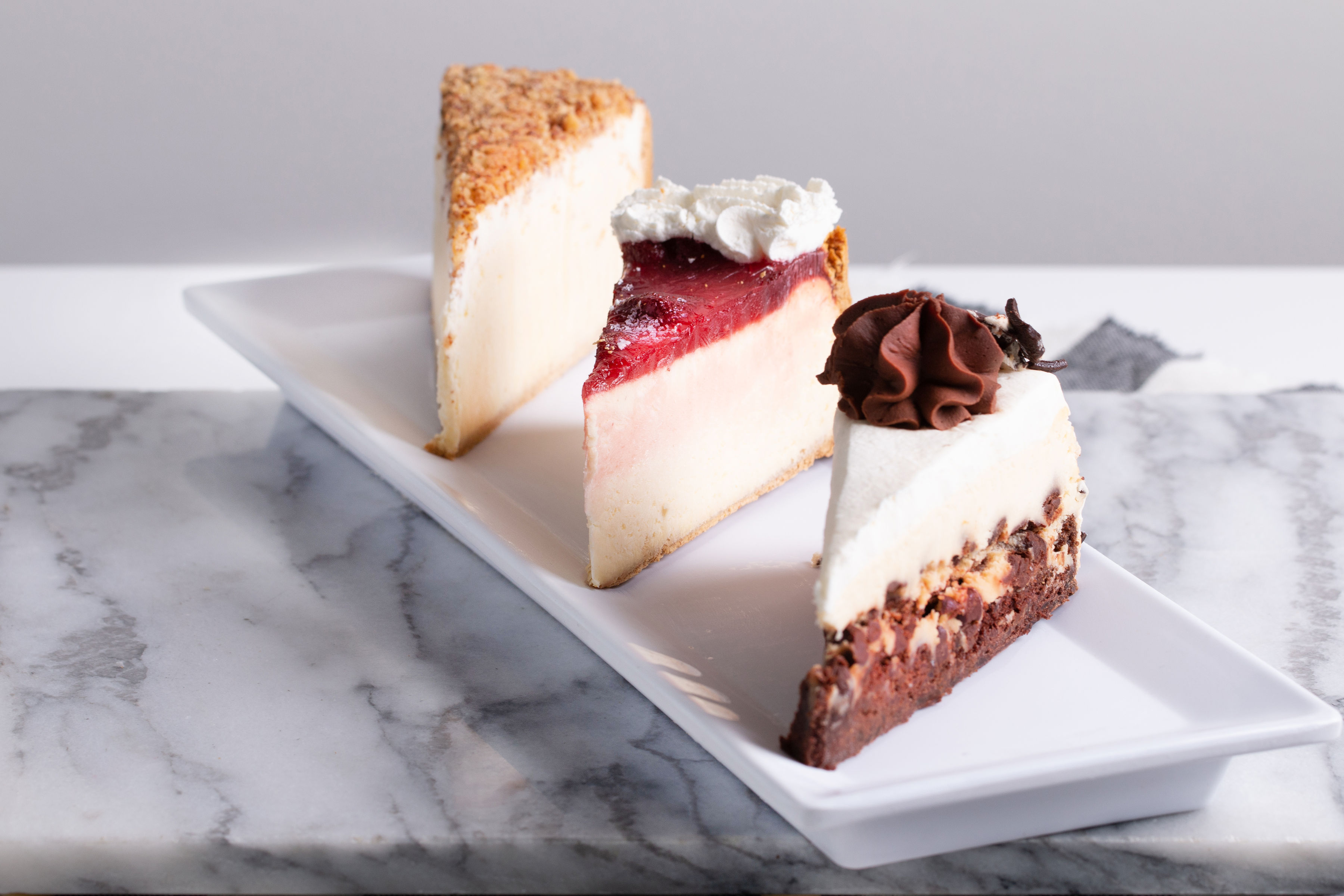 Order Strawberry Cheesecake food online from Java Bakery Cafe Lake Forest store, Lake Forest on bringmethat.com