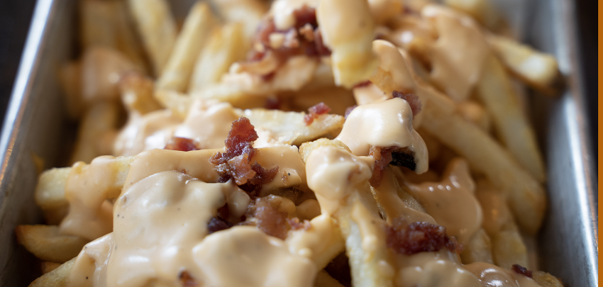Order Beer Cheese & Bacon Fries food online from Beerhead Bar & Eatery store, Painesville on bringmethat.com