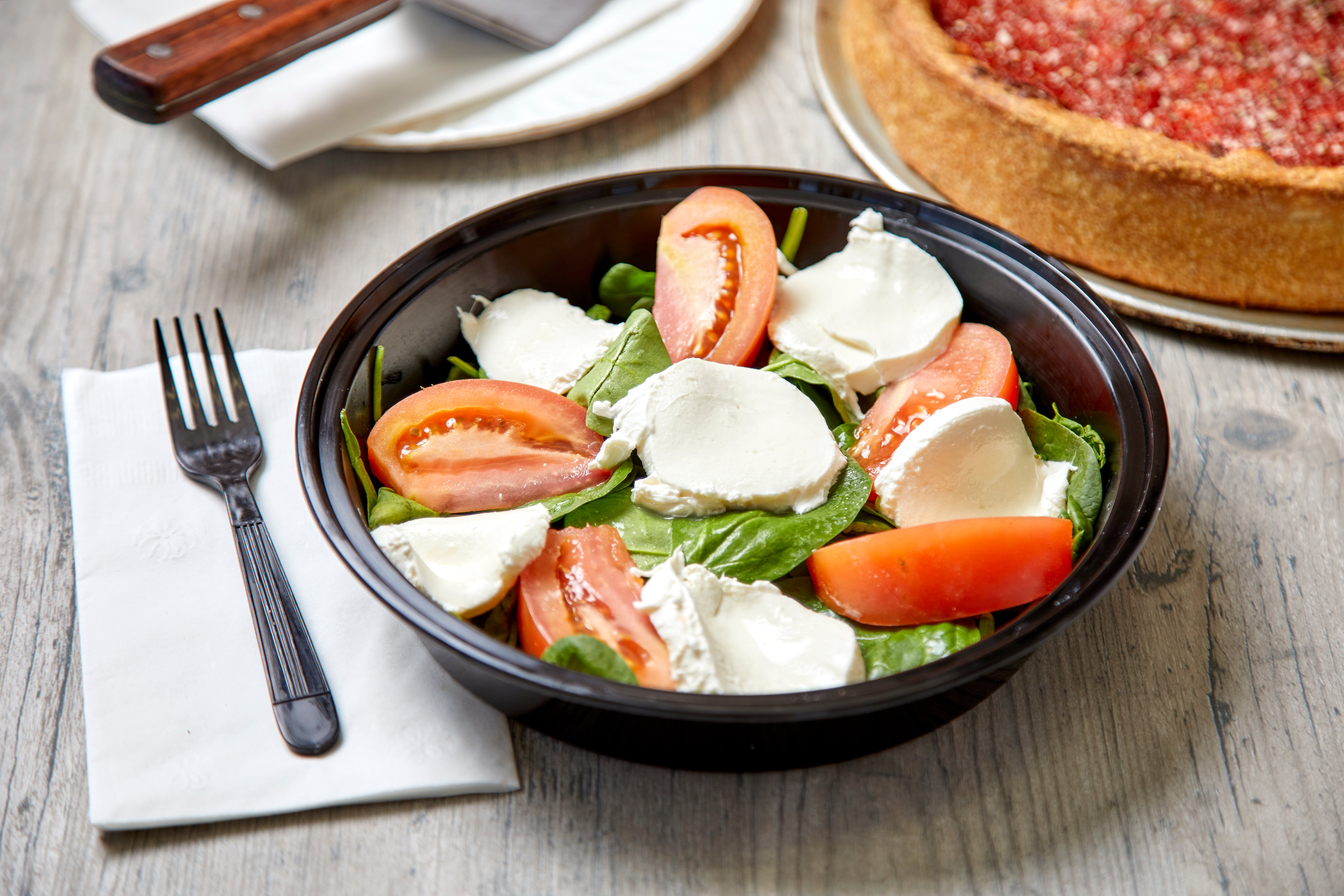 Order Caprese Salad - Individual (Serves 1-2 People) food online from Papa Ray Pizza & Wings store, Addison on bringmethat.com