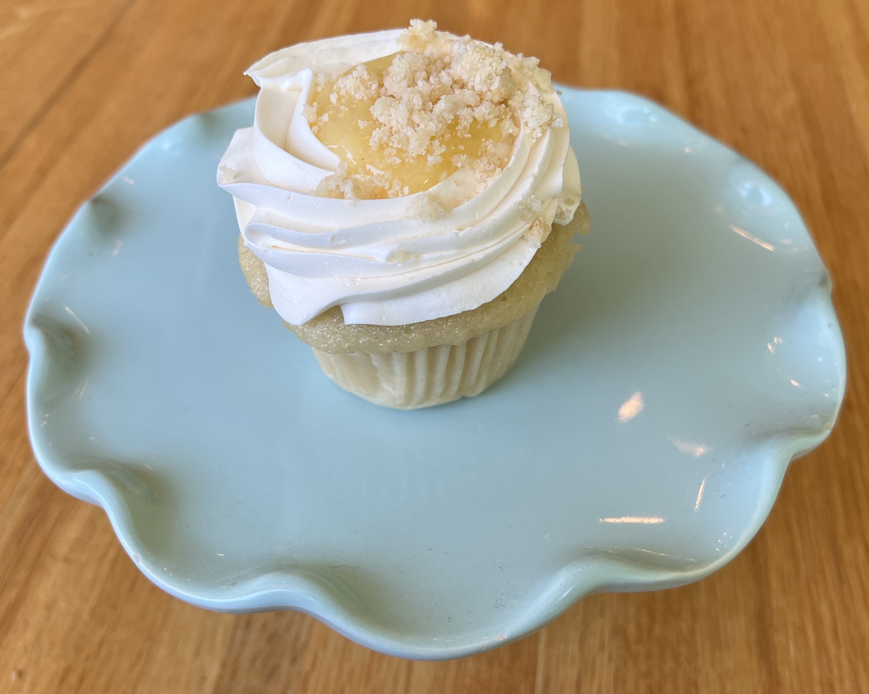 Order Lemon Supreme Cupcake food online from Courageous Bakery & Cafe store, Oak Park on bringmethat.com