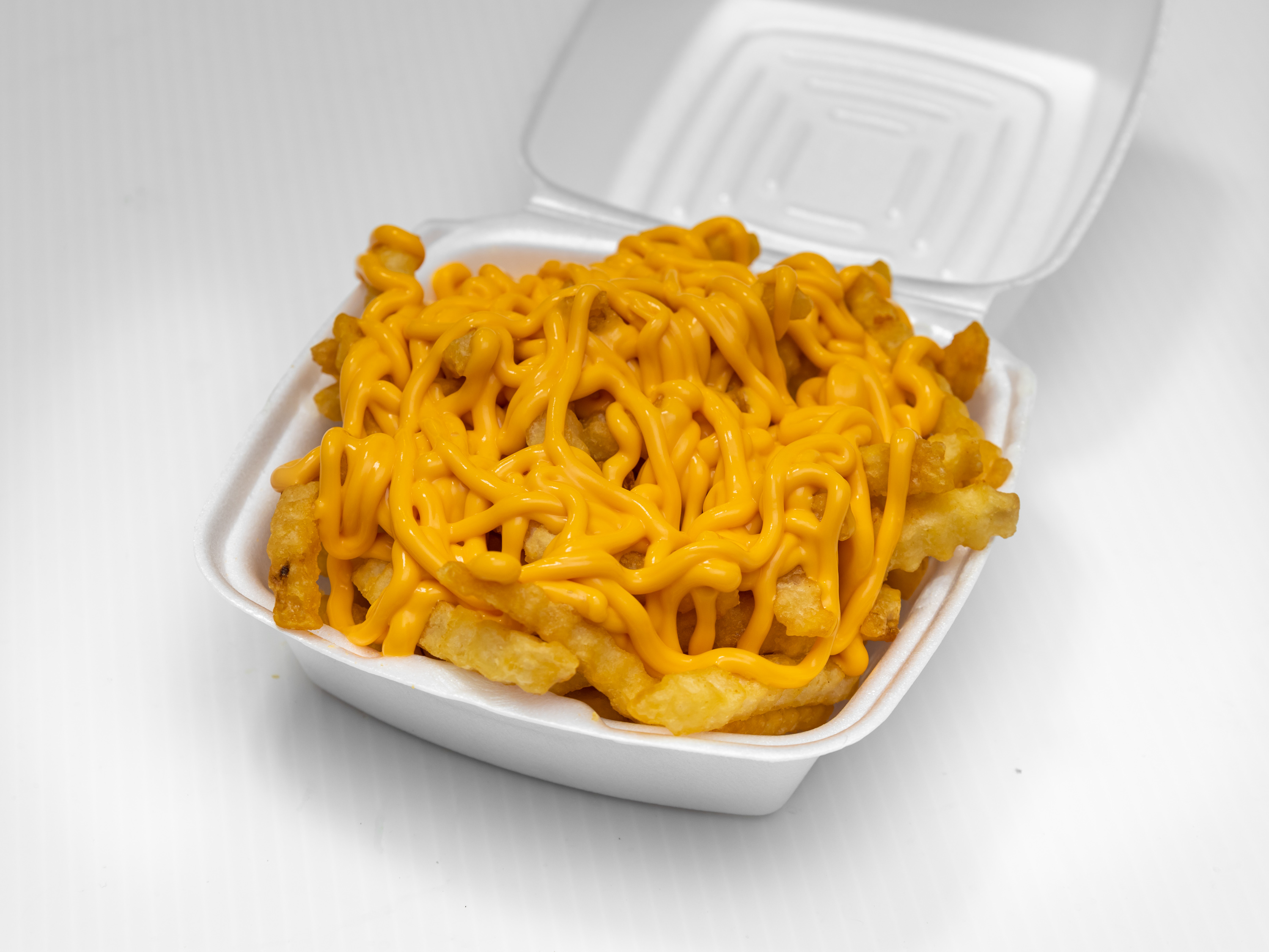 Order Cheese Fries food online from Crown Fried Chicken store, Newark on bringmethat.com