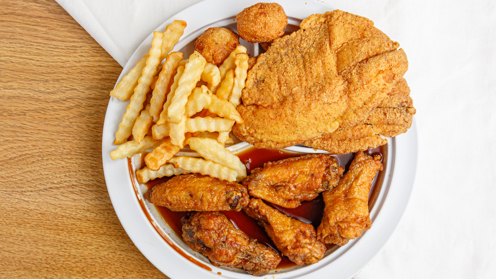 Order 2 Piece Tilapia Fish and 5 Piece Wings Combo food online from Atl Wings store, Virginia Beach on bringmethat.com