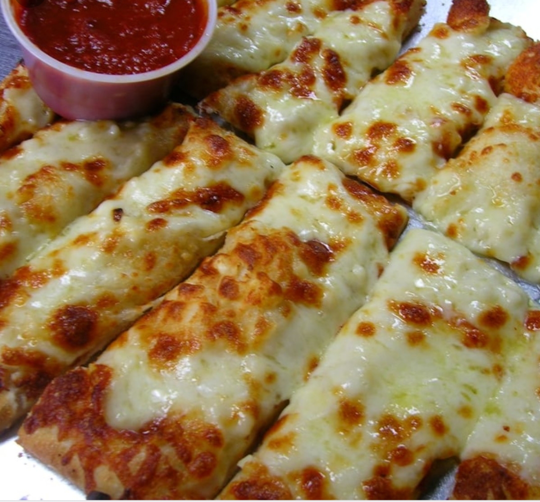 Order Garlic Cheese Breadsticks food online from Ameci Pizza & Pasta store, Santa Clarita on bringmethat.com