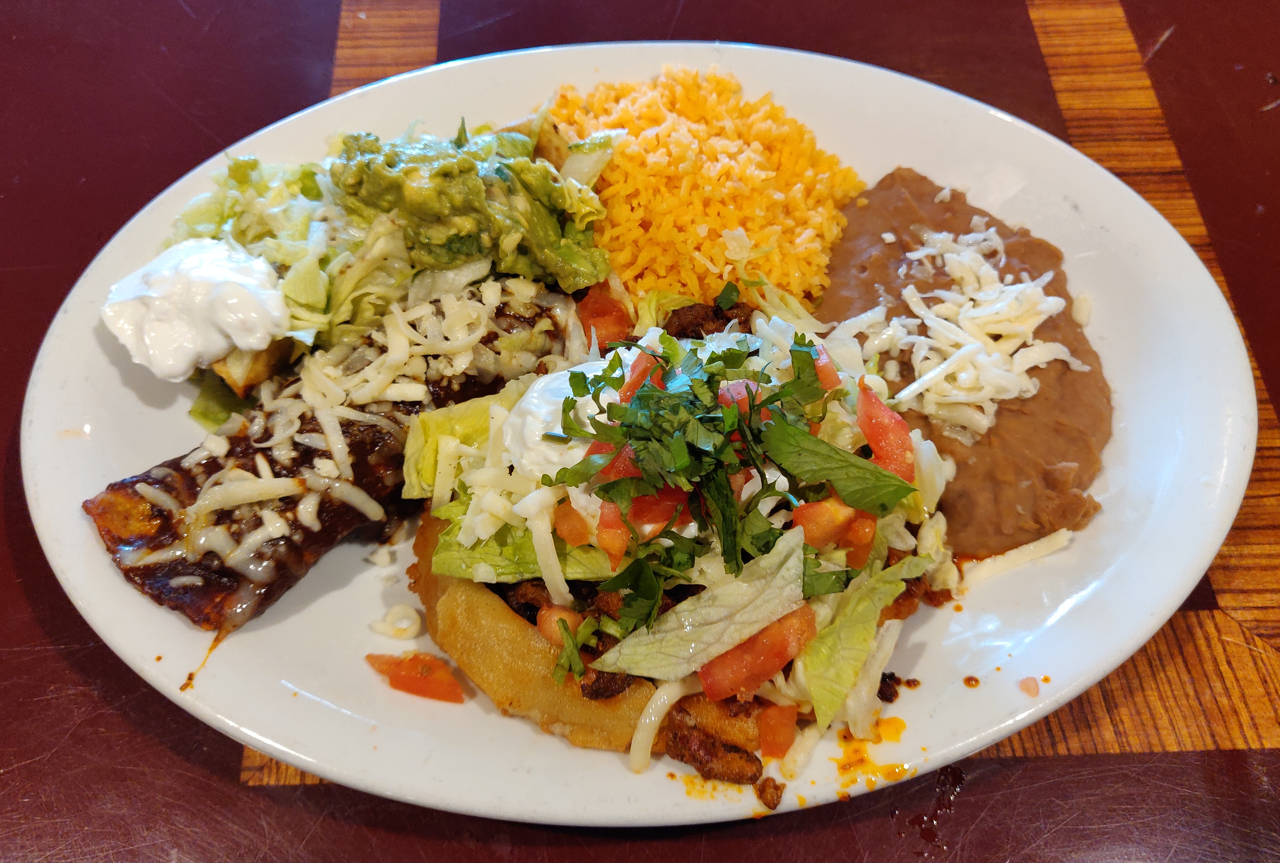 Order Flauta, Sope and Enchilada Dinner food online from Taqueria El Ranchito store, Chicago on bringmethat.com
