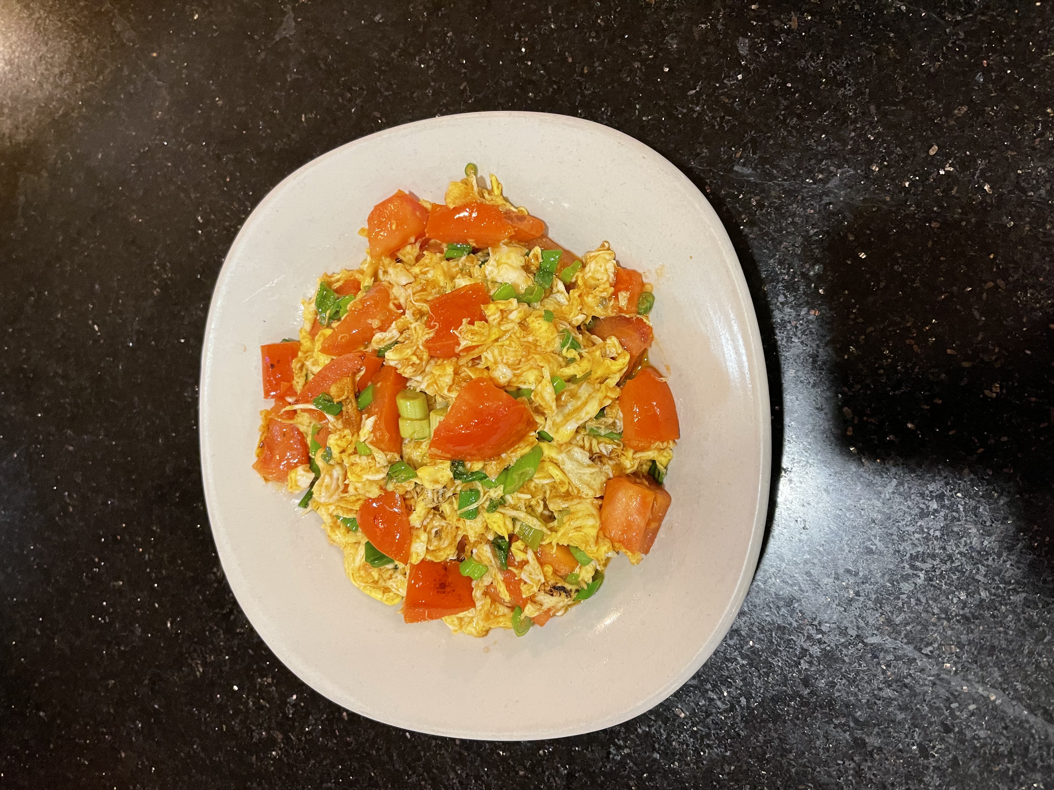 Order 57. Tomato with Scrambled Egg food online from M's Kitchen store, Artesia on bringmethat.com