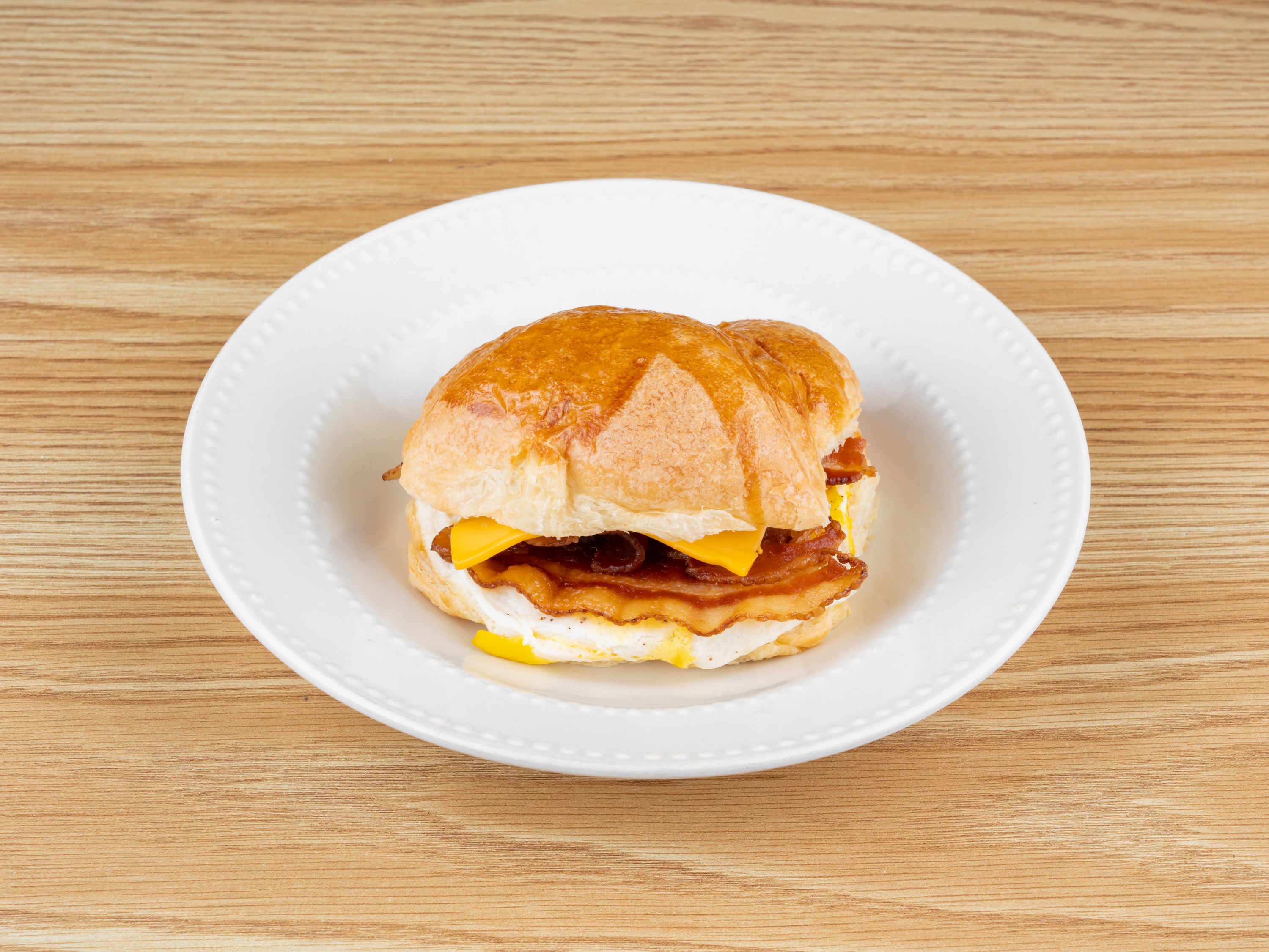 Order Bacon, Egg & Cheese Croissant food online from Goodies Donuts store, Rosharon on bringmethat.com