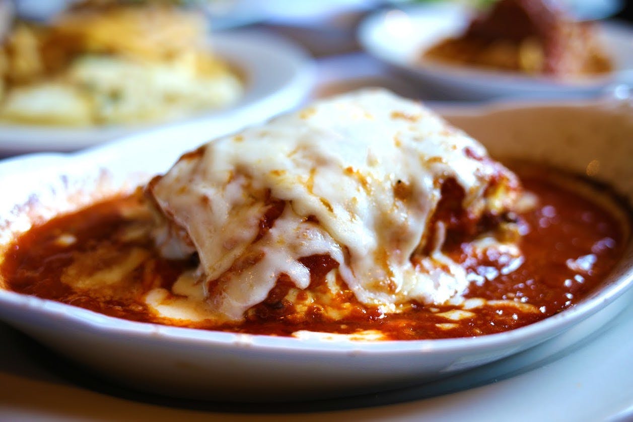 Order Meat Lasagna - Pasta food online from Mario's Restaurant store, Clifton on bringmethat.com