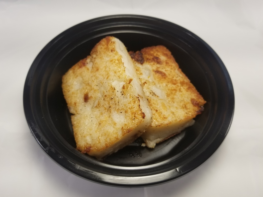 Order Turnip Cake (Daikon 2pcs.) food online from Lucky Deli store, Los Angeles on bringmethat.com