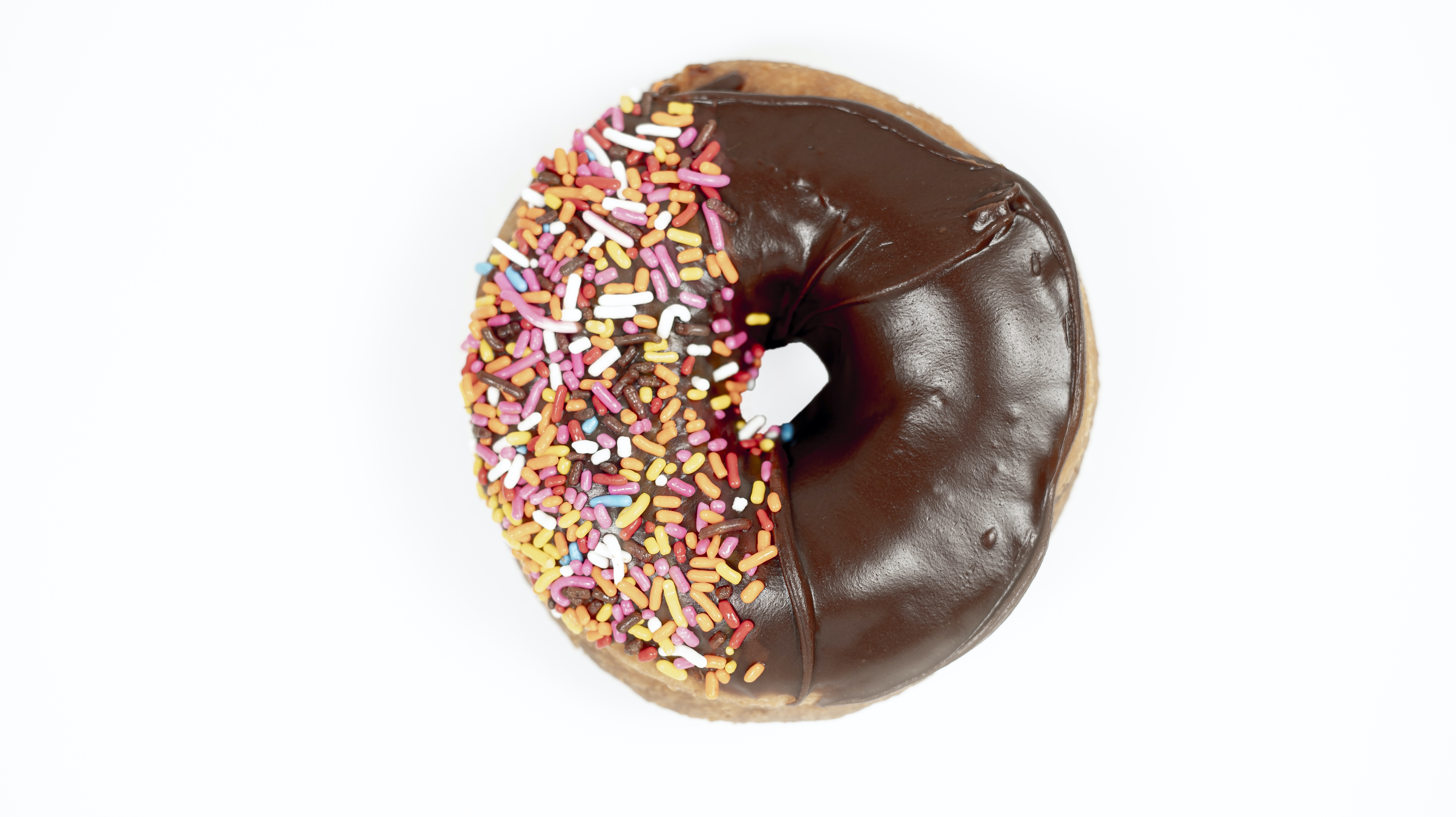 Order Plain Chocolate-Frosted food online from Kane's Donuts store, Saugus on bringmethat.com