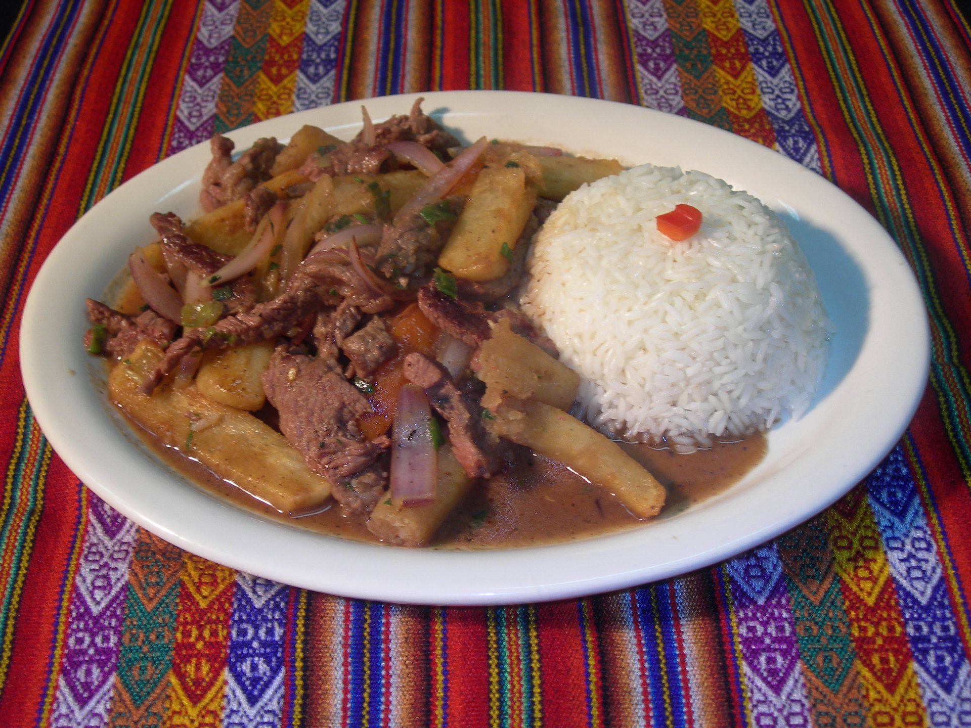 Order 23. Lomo Saltado food online from Aires Del Peru store, Garden Grove on bringmethat.com