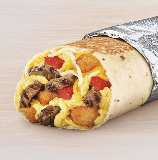 Order Grande Toasted Breakfast Burrito Steak food online from Taco Bell store, Vista on bringmethat.com