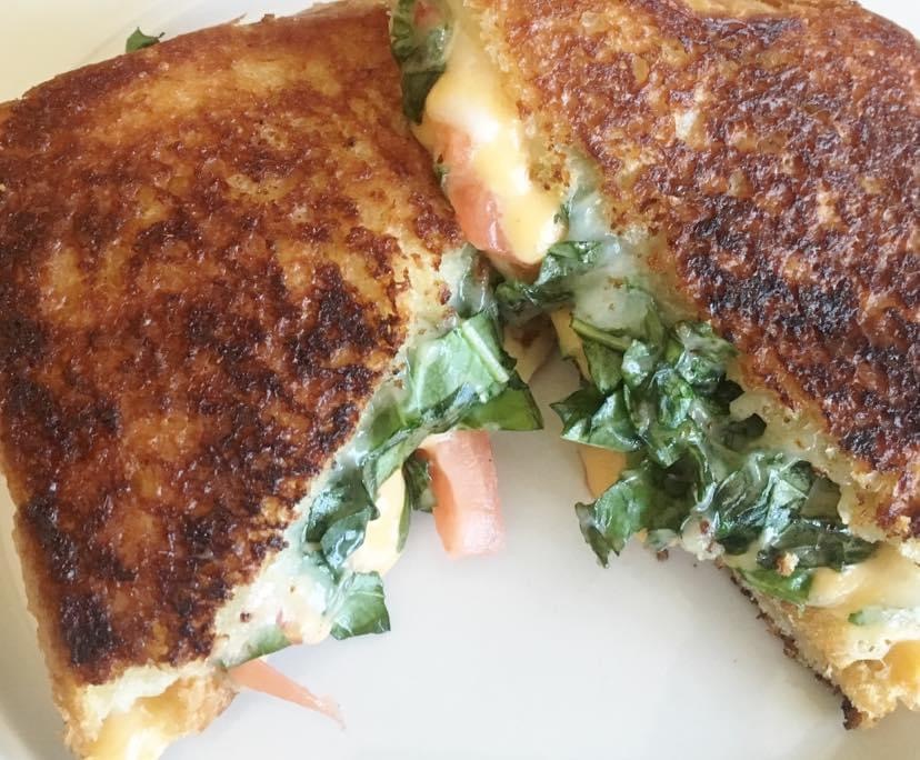 Order Spinach pesto grilled cheese with apple food online from Sweet Willow Cafe store, De Pere on bringmethat.com
