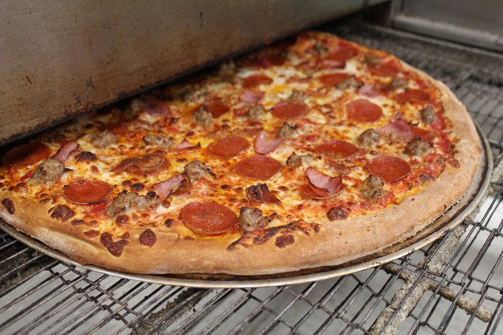 Order 2. Our Famous "Meat Lovers" Pizza food online from The Pizza and Wings Guy store, Flagstaff on bringmethat.com