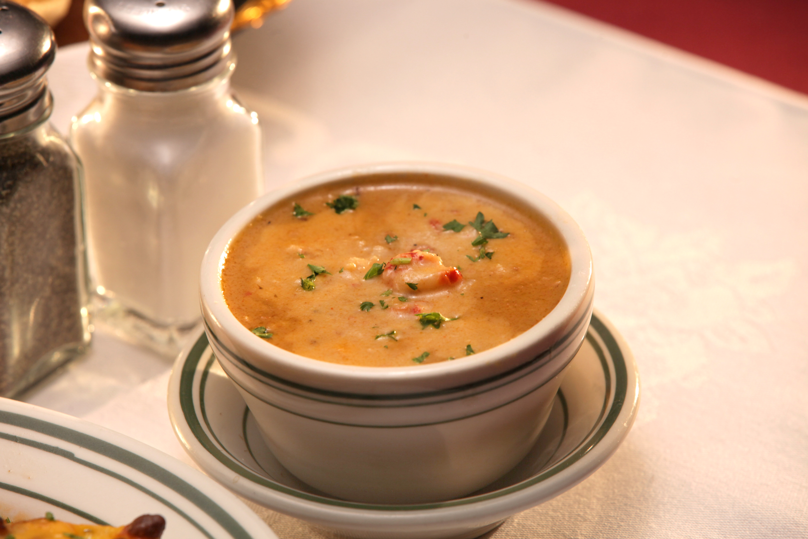 Order Cup of Crawfish and Corn Soup food online from Poorboy's Riverside Inn store, Broussard on bringmethat.com