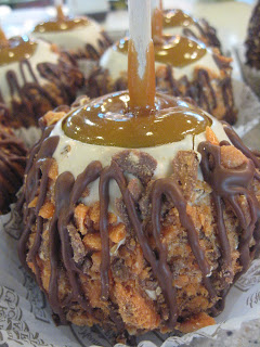 Order Butterfinger Caramel Apple food online from Rocky Mountain Chocolate Factory store, Iowa City on bringmethat.com