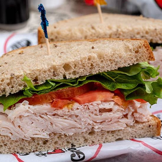 Order *Turkey Sandwich food online from Groucho's Deli store, Rock Hill on bringmethat.com