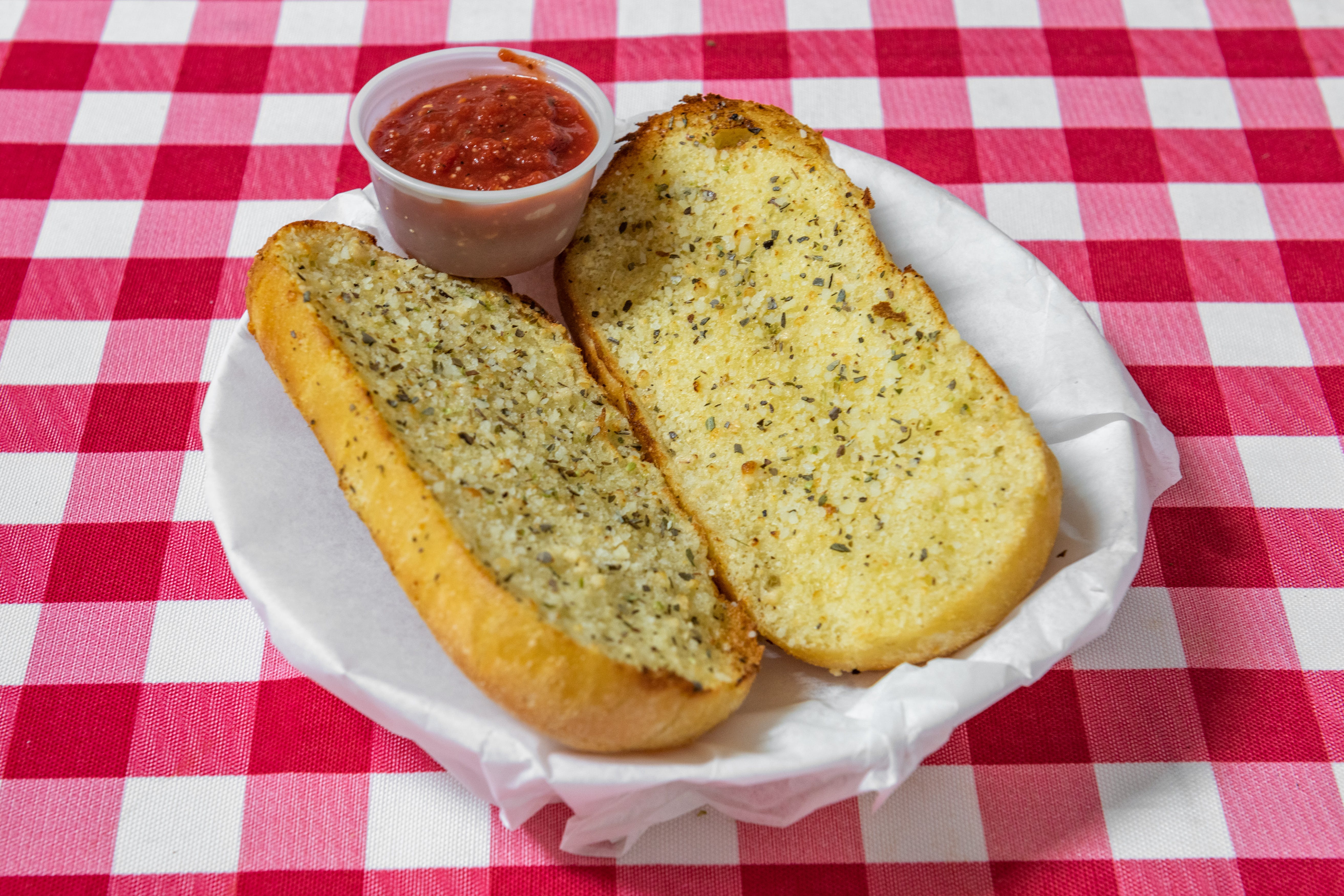 Order Garlic Bread - Appetizer food online from Sunny's Pizza store, San Marcos on bringmethat.com