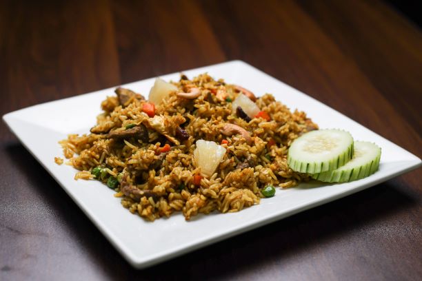 Order Pineapple Fried Rice food online from i love pad thai store, Omaha on bringmethat.com