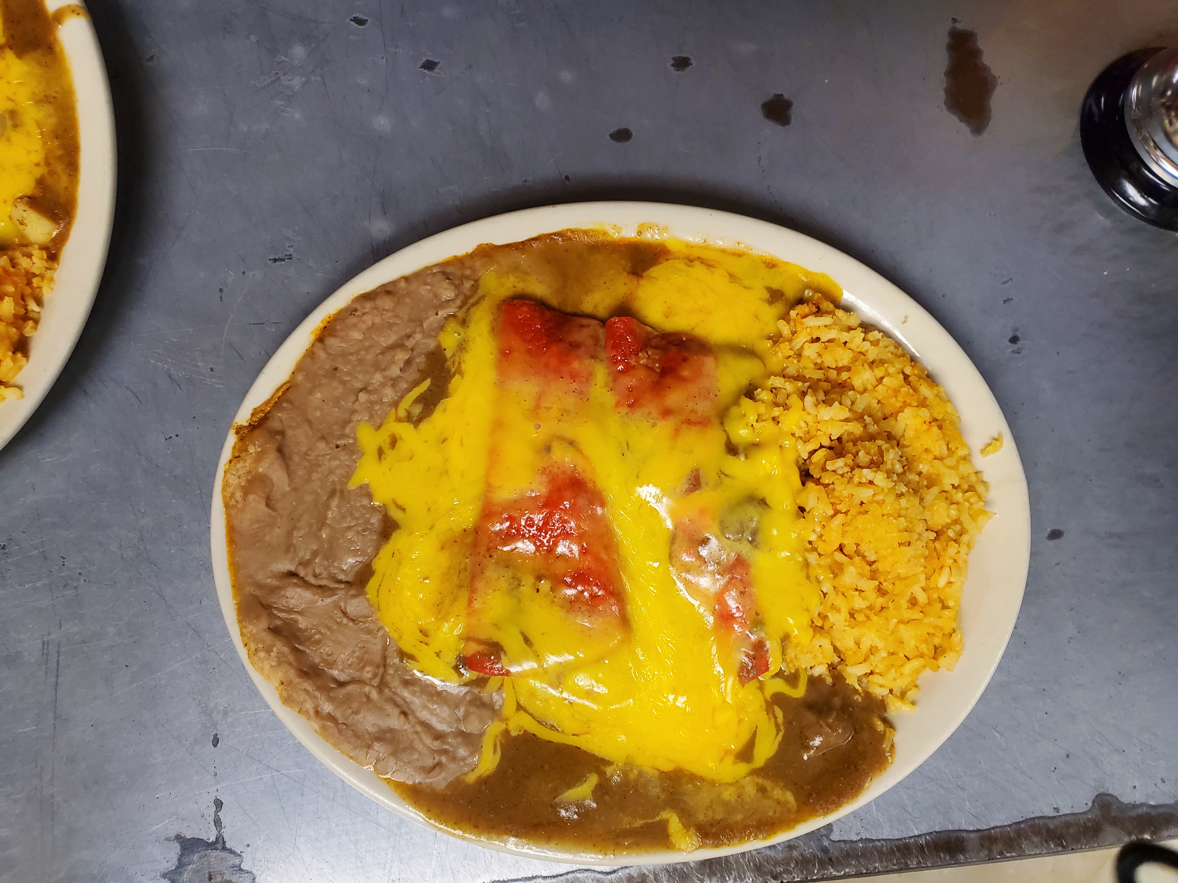 Order Chicken Enchilada Plate food online from Gilberts Restaurant store, San Antonio on bringmethat.com