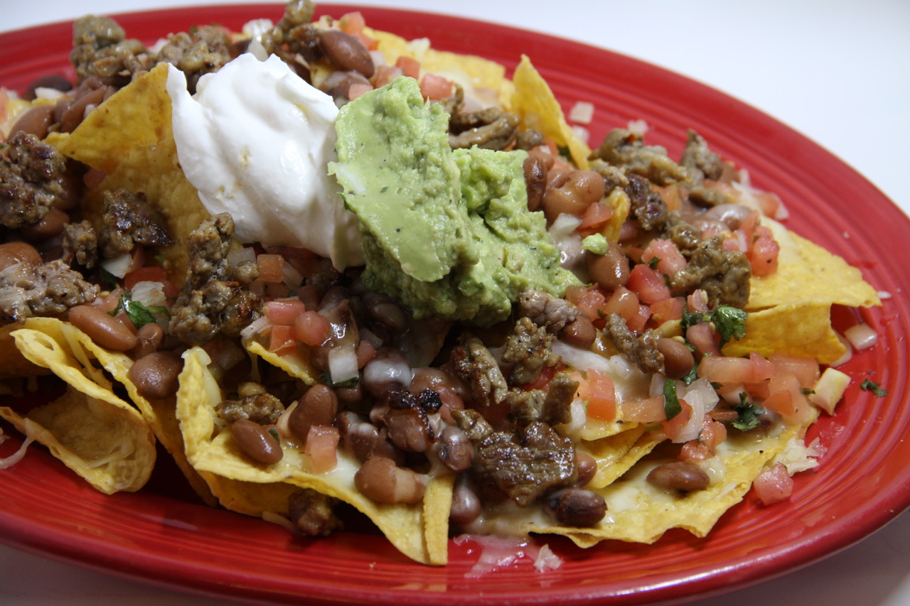 Order Nachos food online from Tulum Mexican Cuisine store, Seattle on bringmethat.com