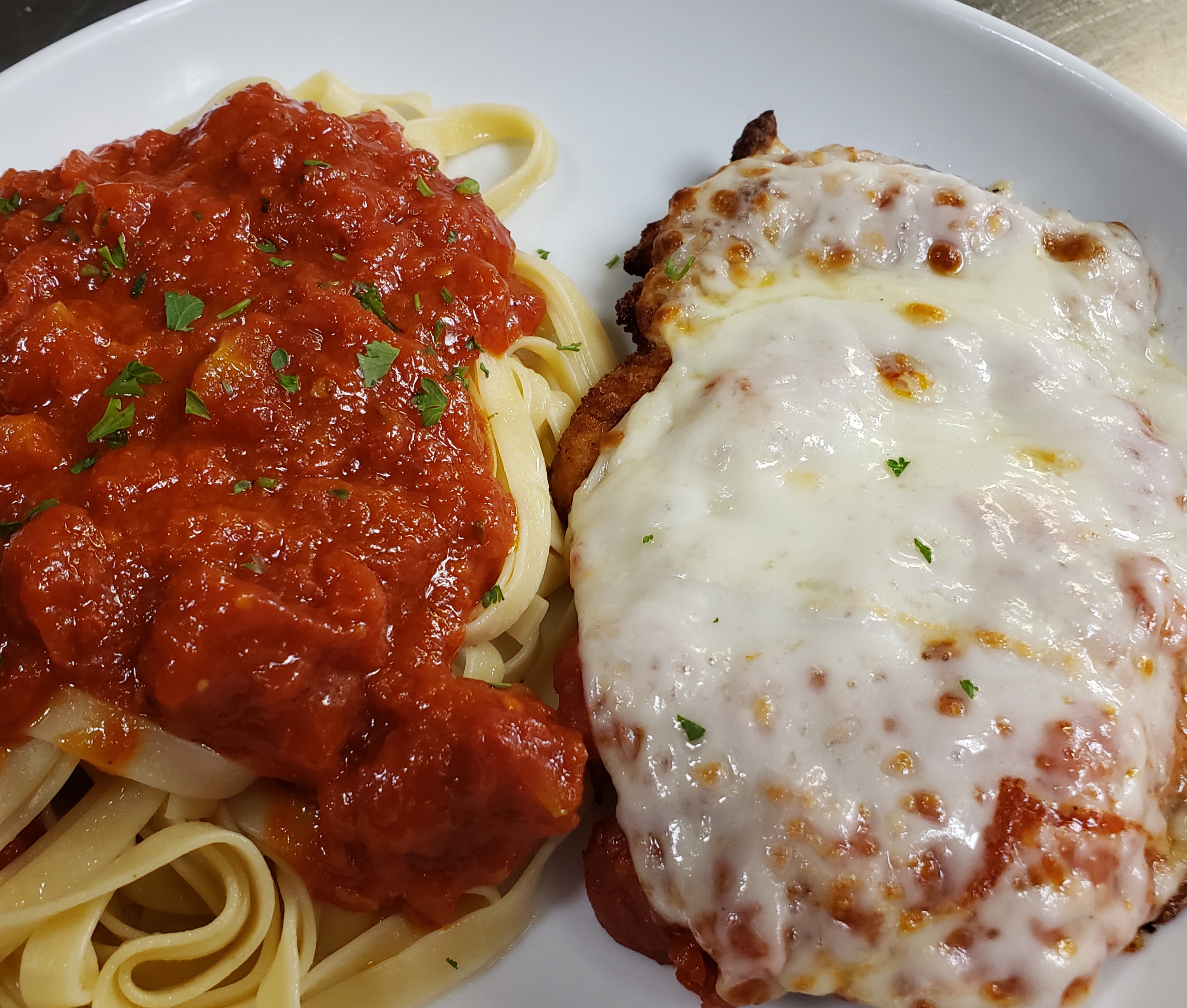 Order Chicken Parmigiana food online from Amiccis store, Baltimore on bringmethat.com