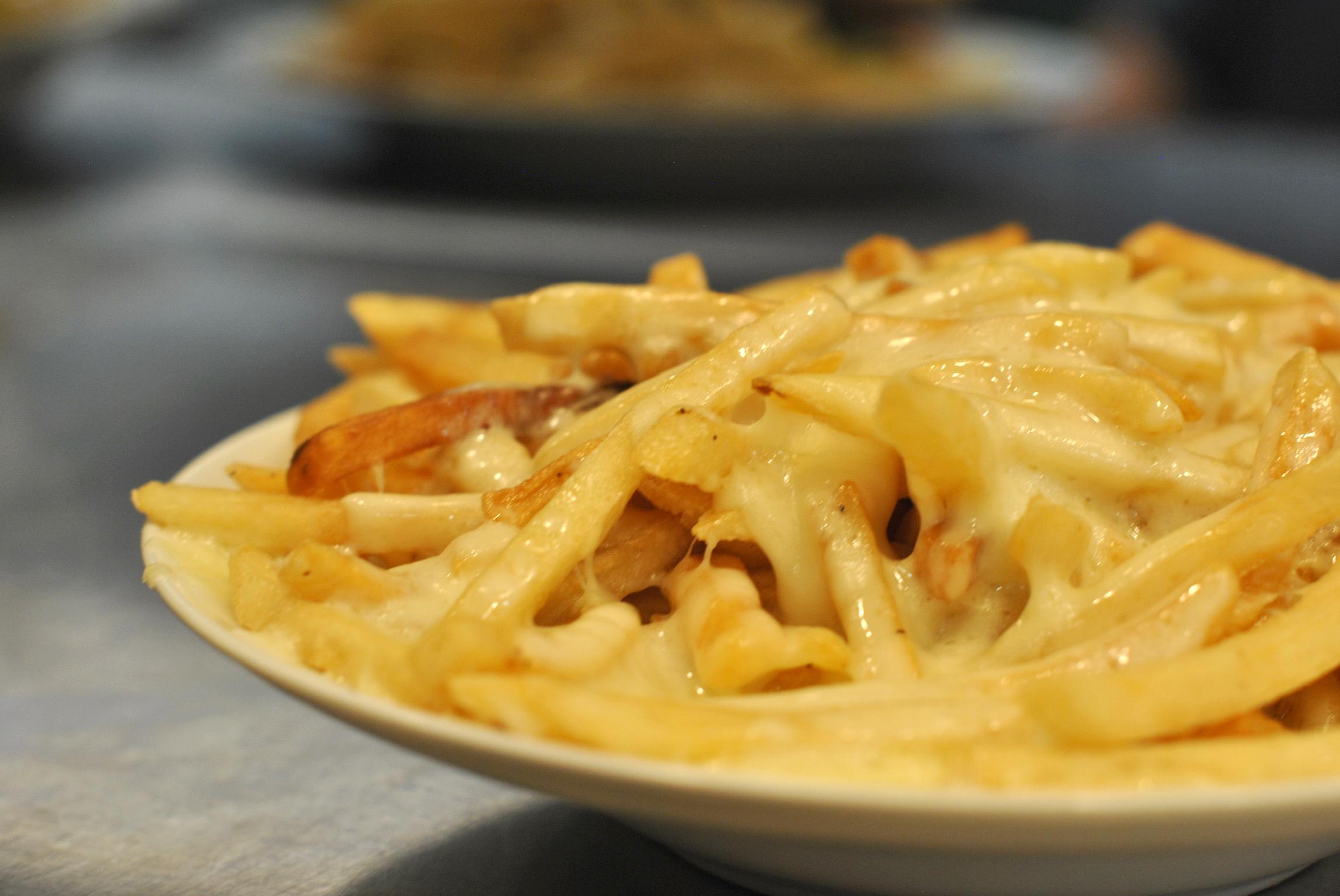 Order Cheese Fries food online from Ray's Grill store, Stanford on bringmethat.com