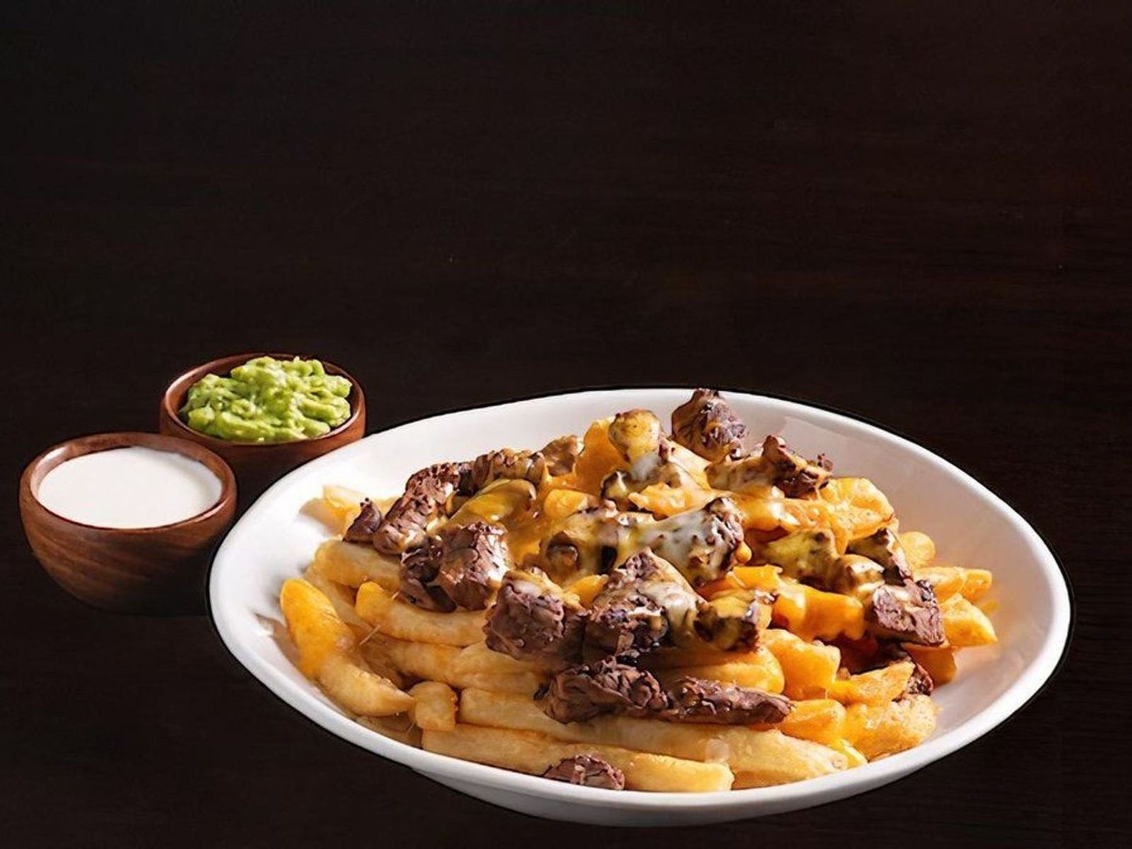 Order Carne Asada Fries ~ food online from El Fresco Mexican Grill store, Centreville on bringmethat.com