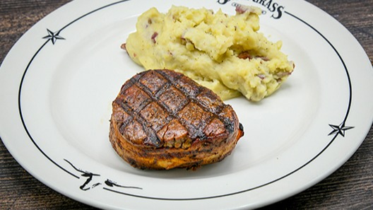 Order Bacon Wrapped Filet food online from Saltgrass Steak House store, San Antonio on bringmethat.com