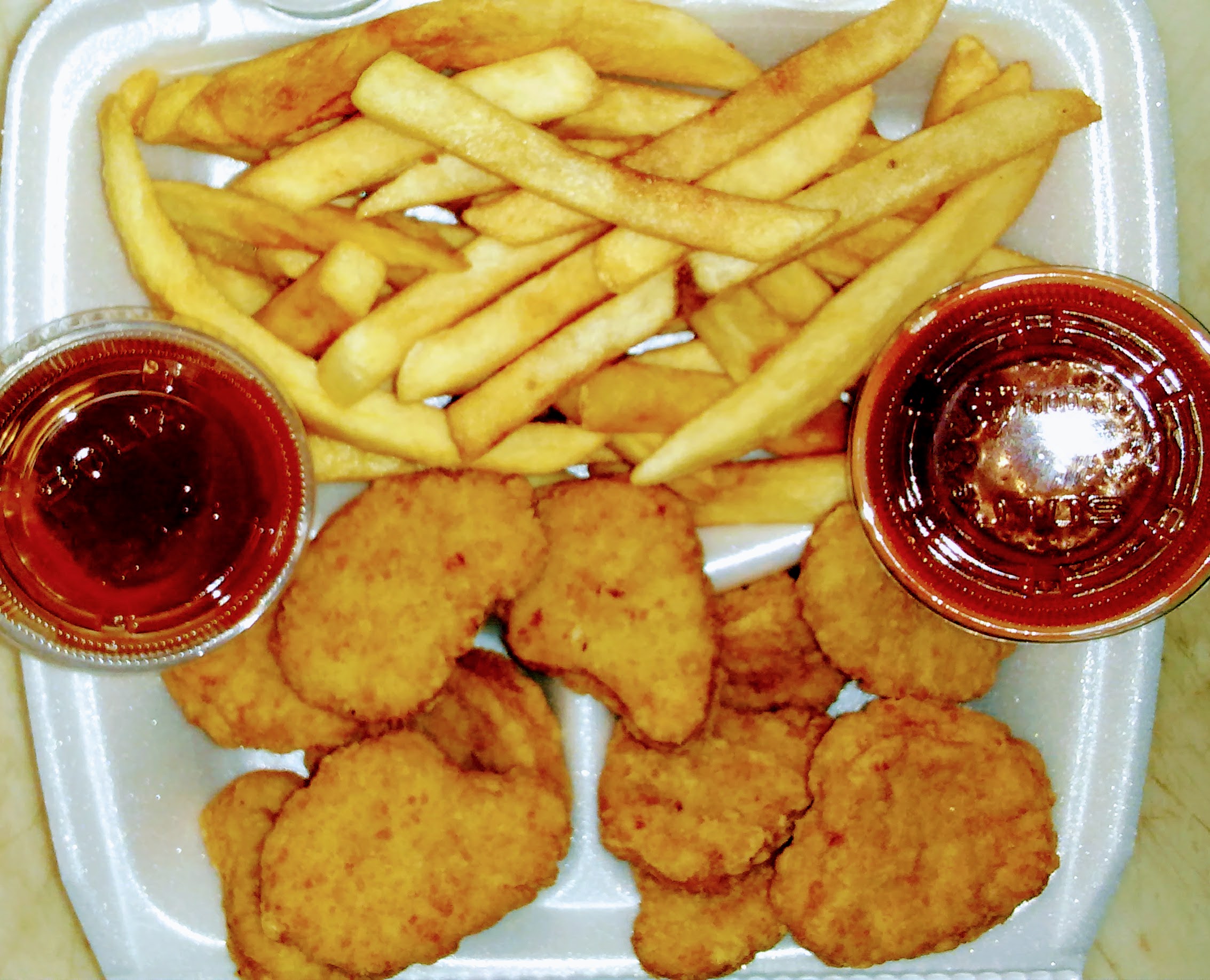 Order 9 Piece Chicken Nuggets food online from Nadia Fish & Chicken store, Chicago on bringmethat.com