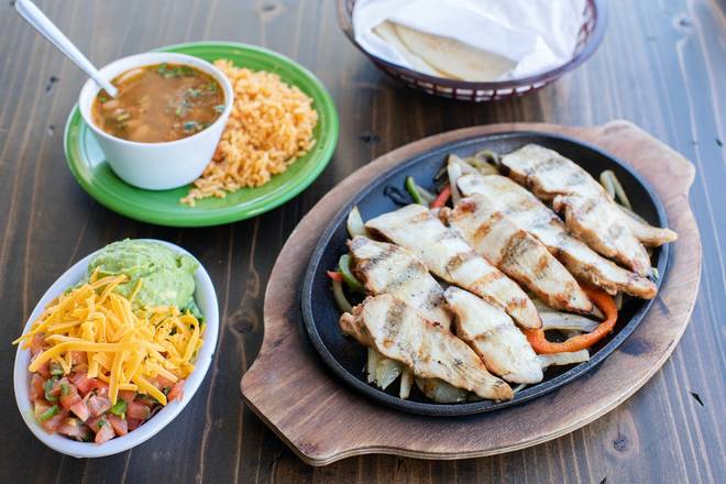 Order 1/2 Pound Chicken Fajitas food online from Blue Goose Cantina store, Mckinney on bringmethat.com