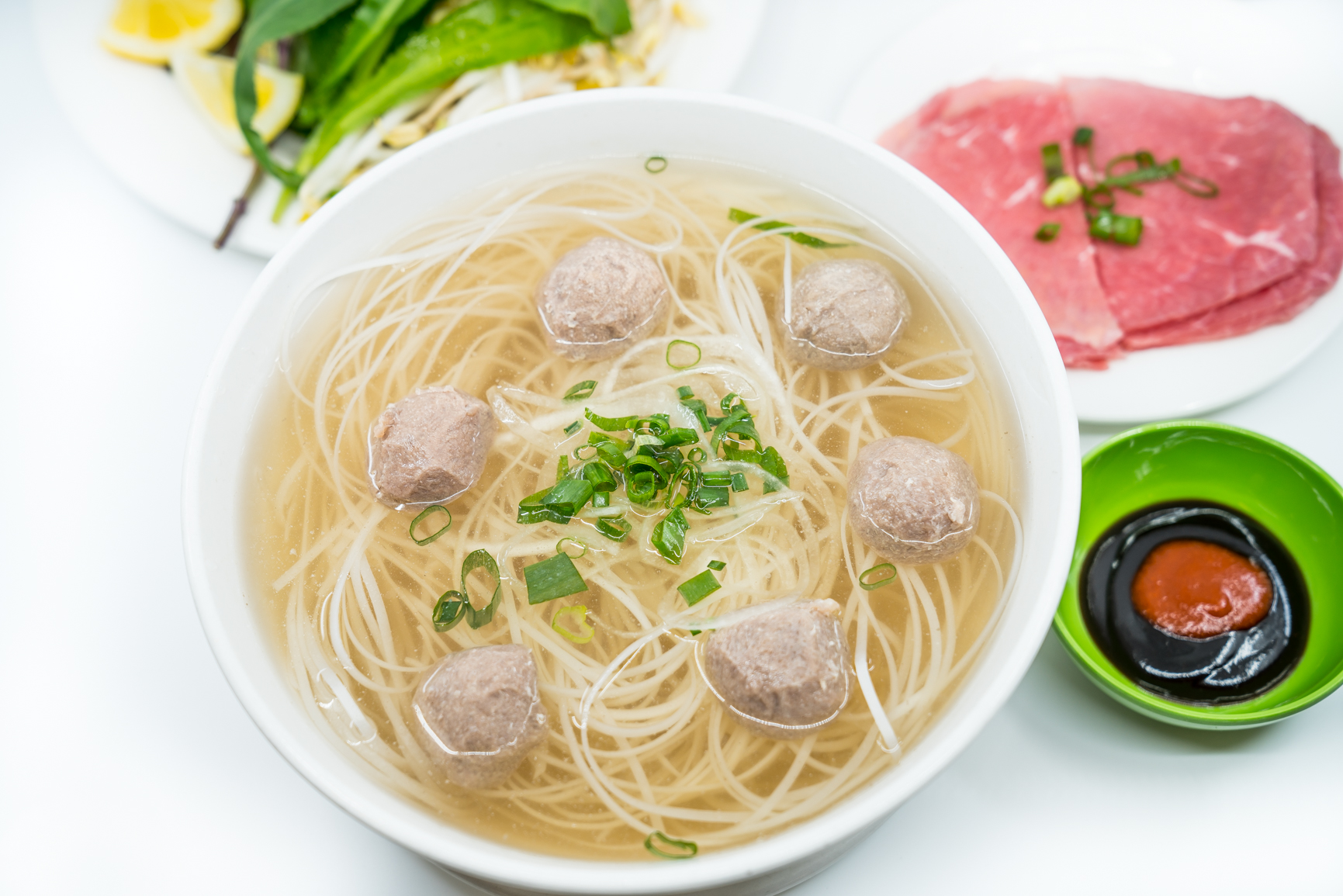 Order 4. Large Steak and Beef Balls Pho Noodle Soup food online from Ha Long Pho Noodle House store, Honolulu on bringmethat.com