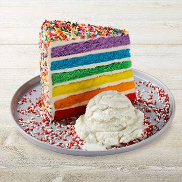 Order Carlo's Bakery Rainbow Cake food online from Tgi Friday store, Cincinnati on bringmethat.com