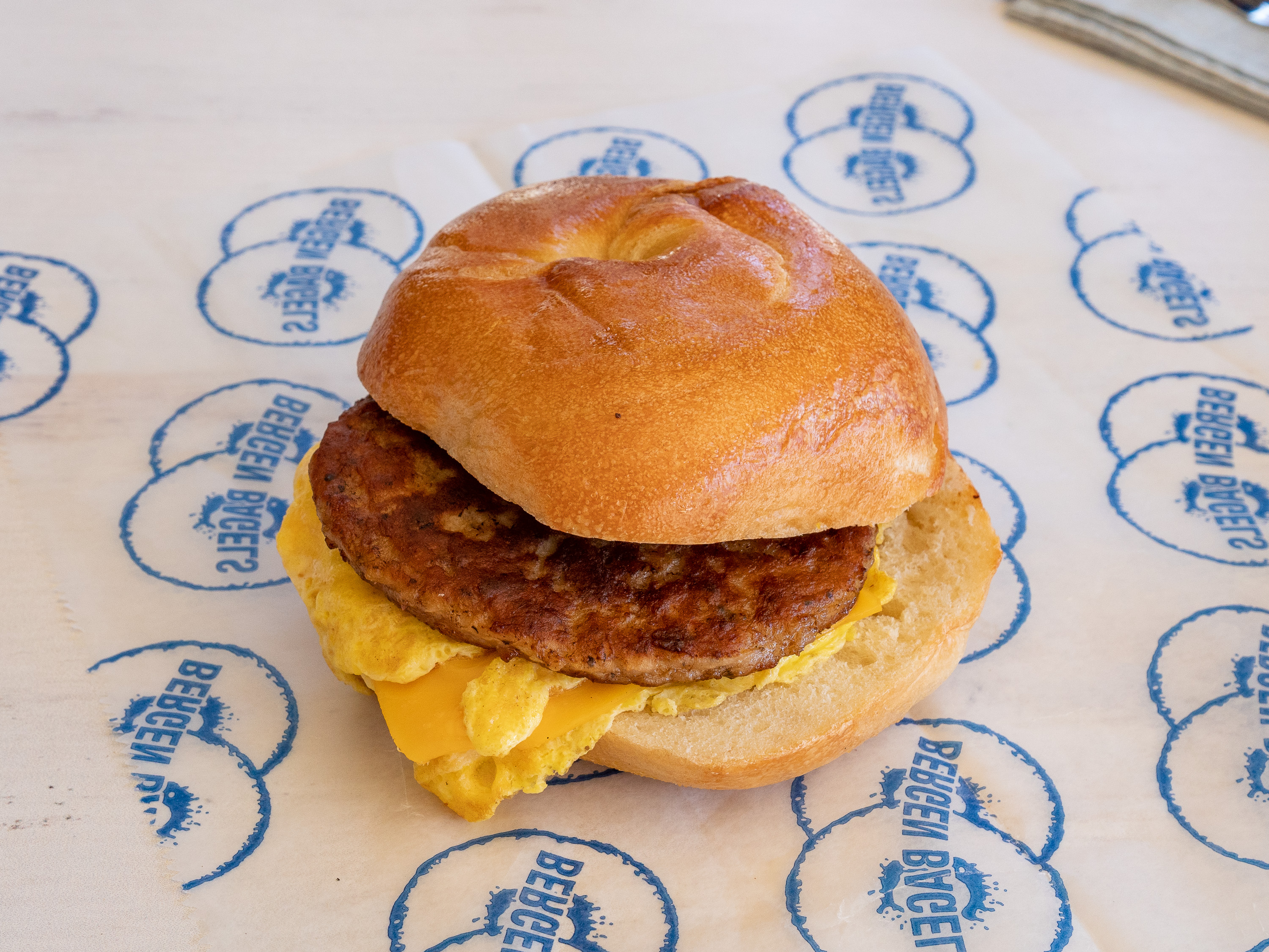 Order Egg and Cheese with Sausage Sandwich food online from Bergen Bagels store, Brooklyn on bringmethat.com