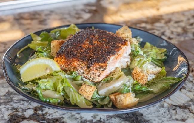 Order Blackened Salmon Caesar Salad food online from Molly's Garden store, Seattle on bringmethat.com
