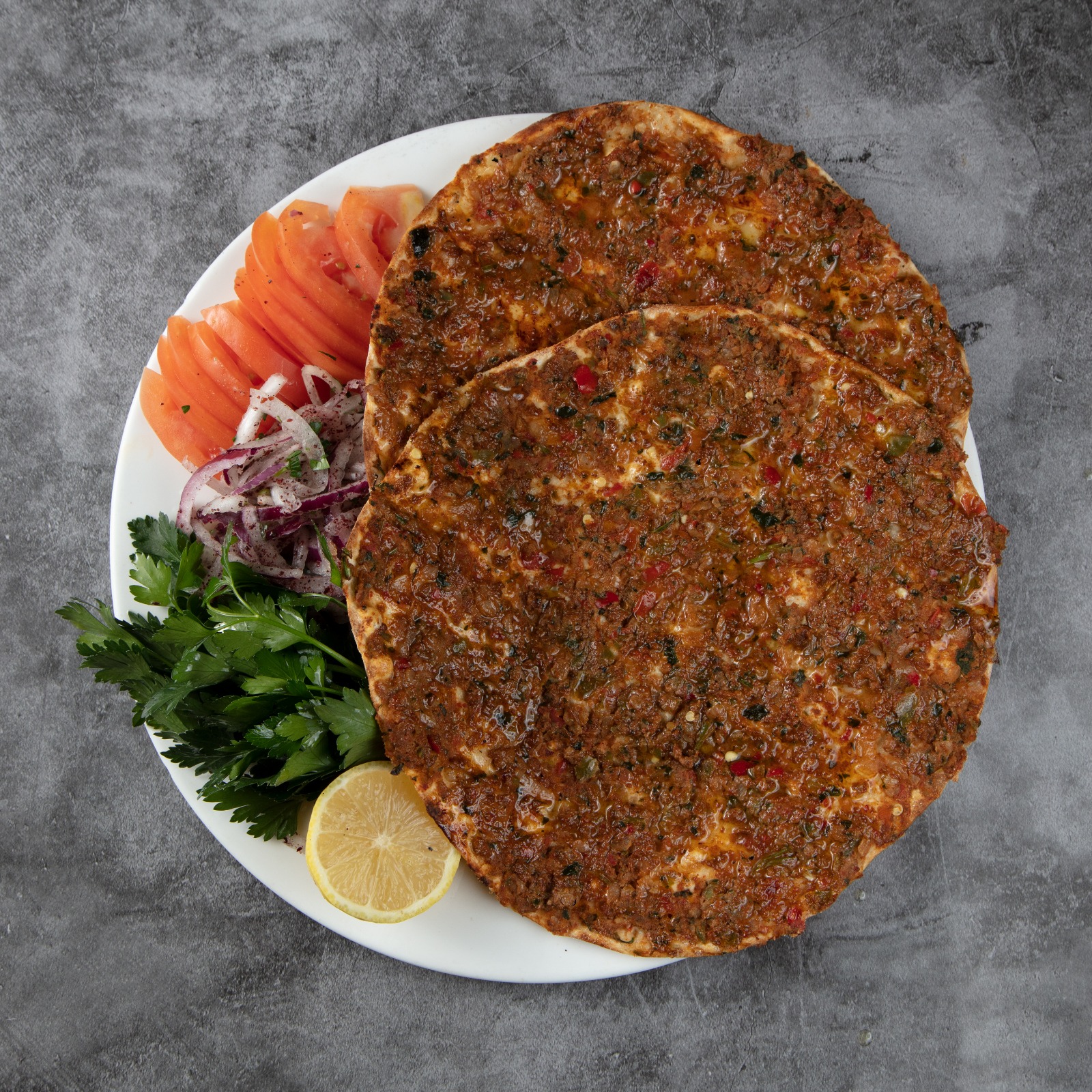 Order 24. Lahmacun Portion food online from Beyti turkish kebab store, Brooklyn on bringmethat.com