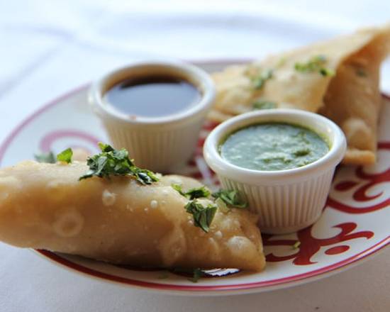 Order Samosa Chat food online from Sangam Restaurant store, Ithica on bringmethat.com